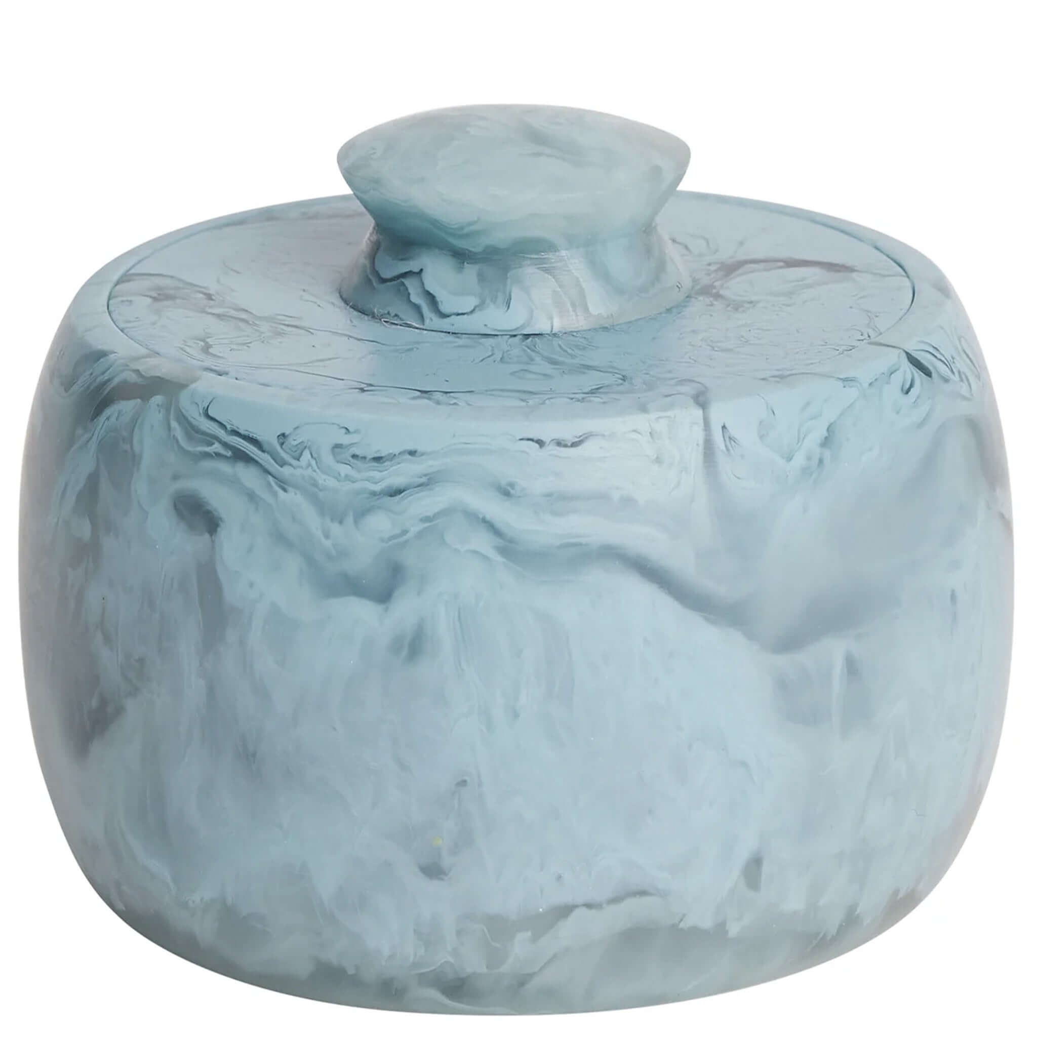 A round Sage x Clare Resin Halleck Canister with a swirling smoke-like pattern in muted colors.