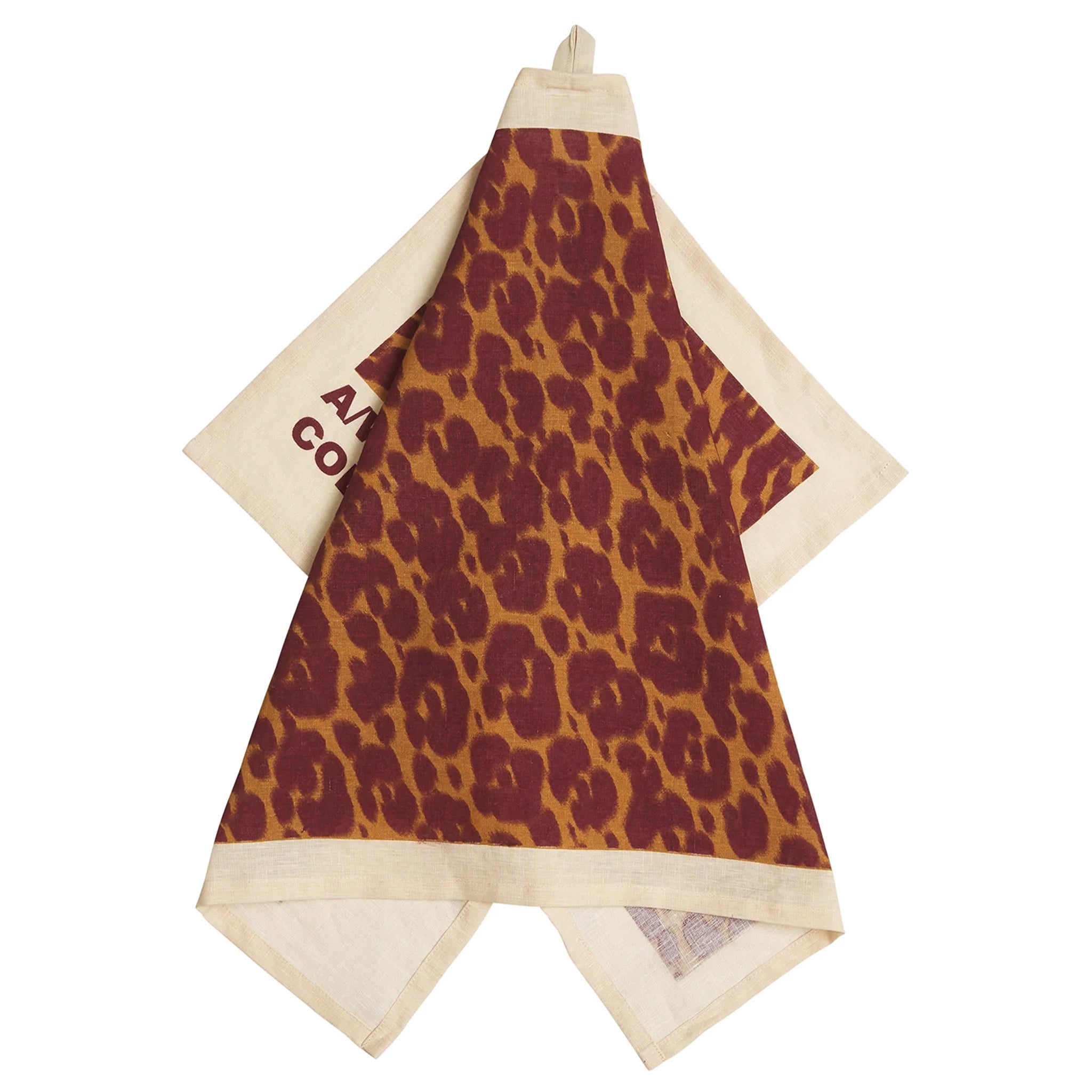A linen tea towel with a animal-like print in a orange and red color scheme