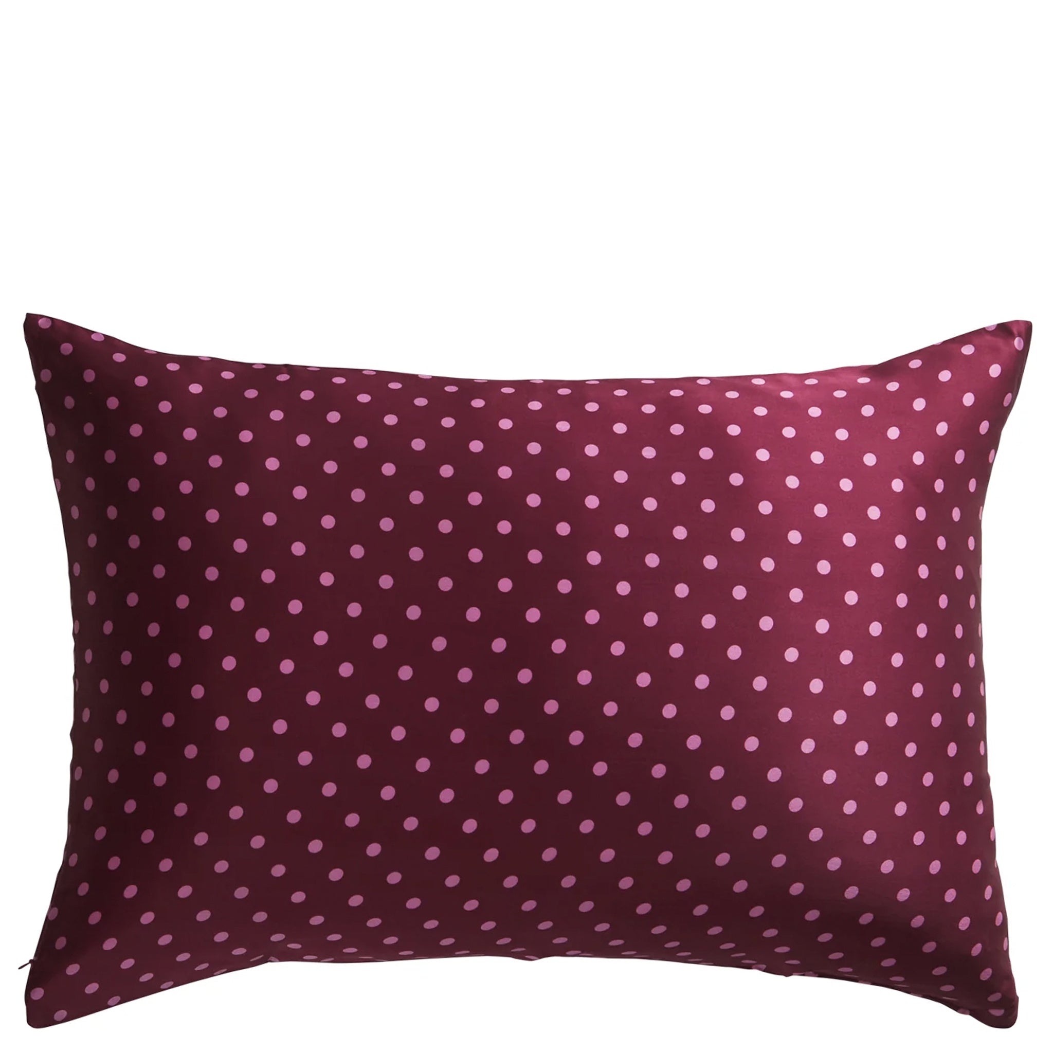 A mahogany colored silk pillowcase with a dotted pattern.