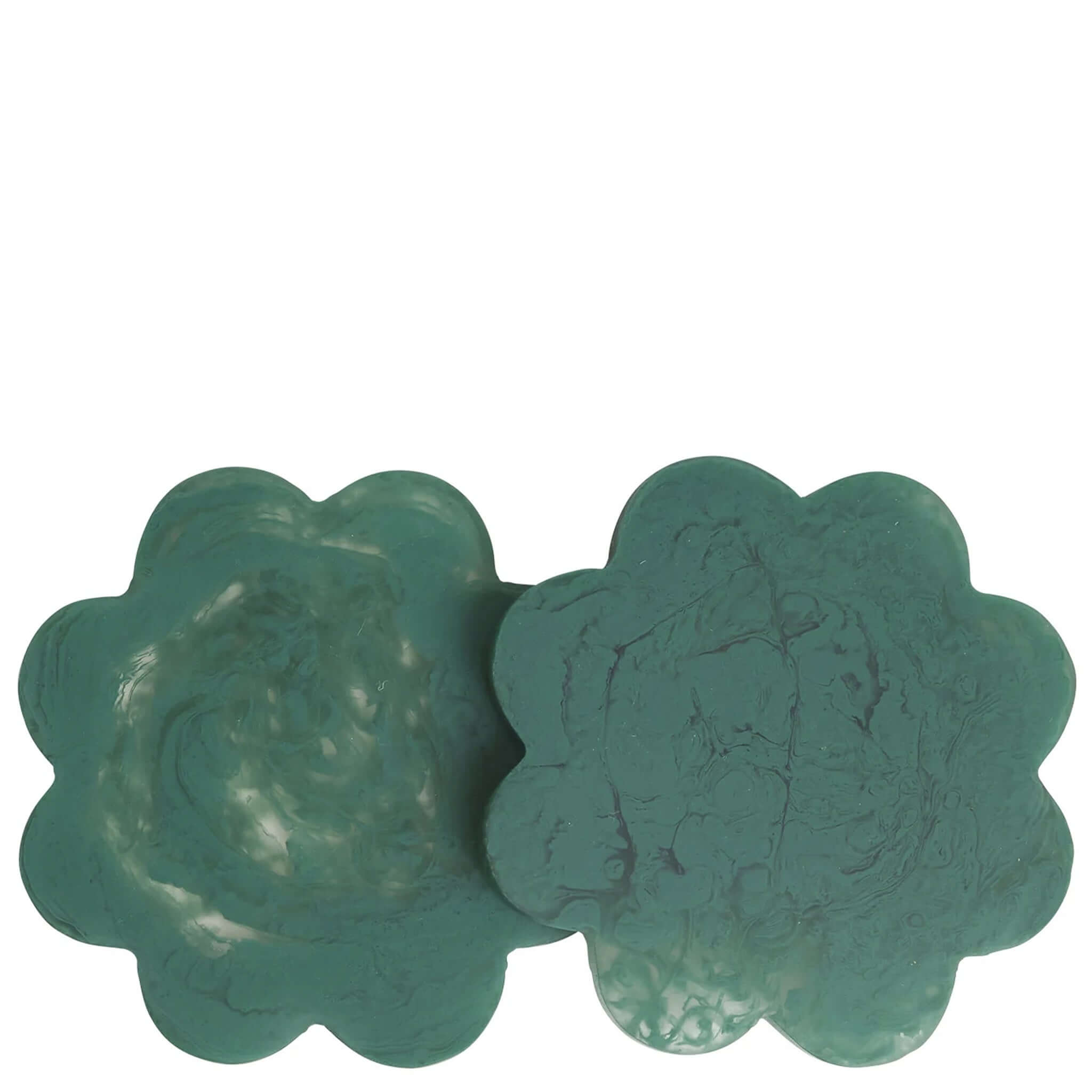 A set of two green floral resin coasters with scalloped edges.