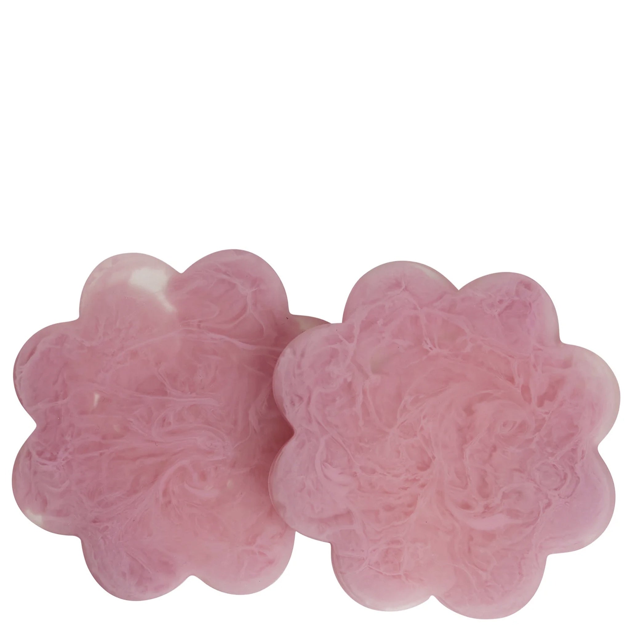 A set of two pink floral resin coasters with scalloped edges.