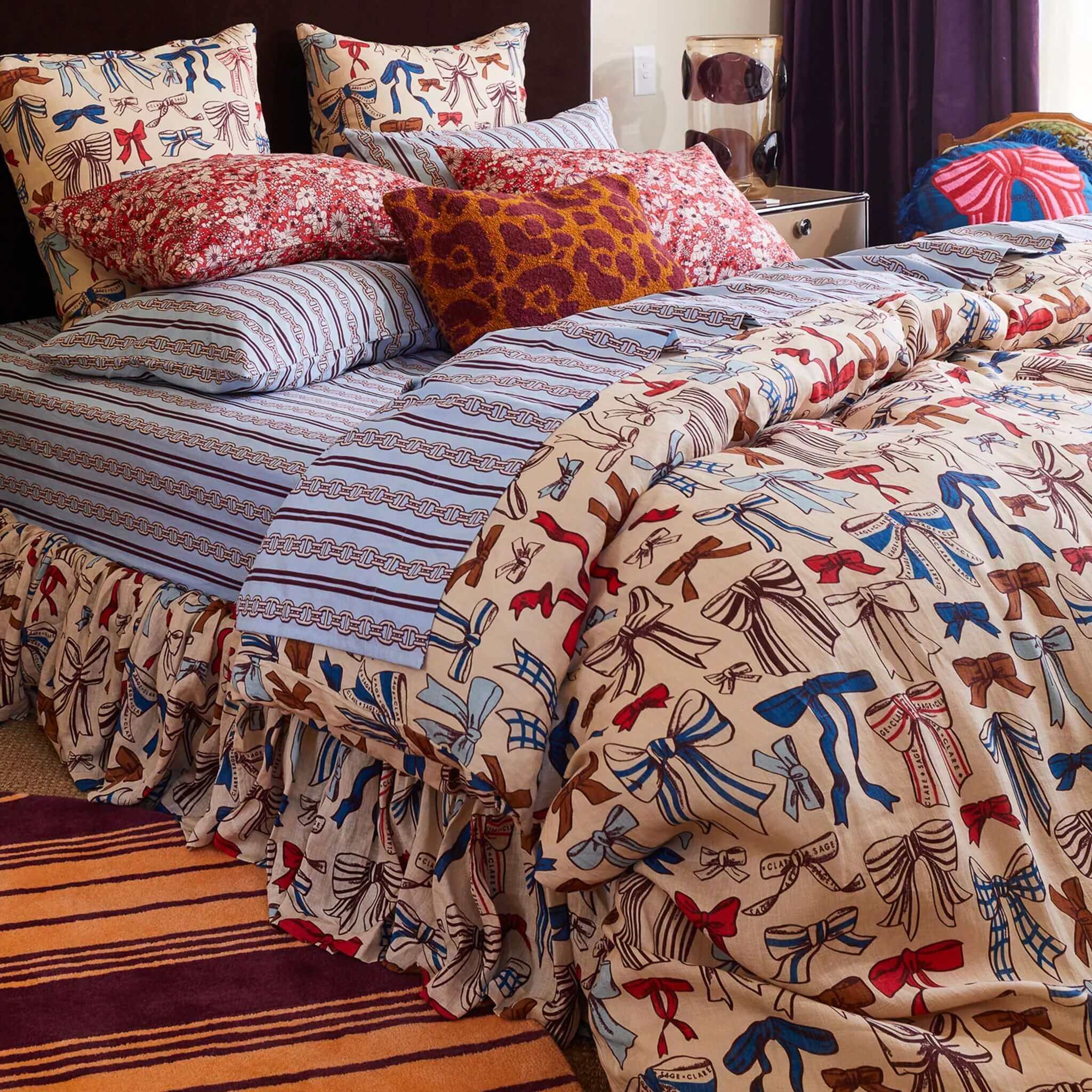 Alt Tag: Sage x Clare Lottie Linen Duvet Cover on bed with patterned European flax linen quilt cover and matching pillowslips