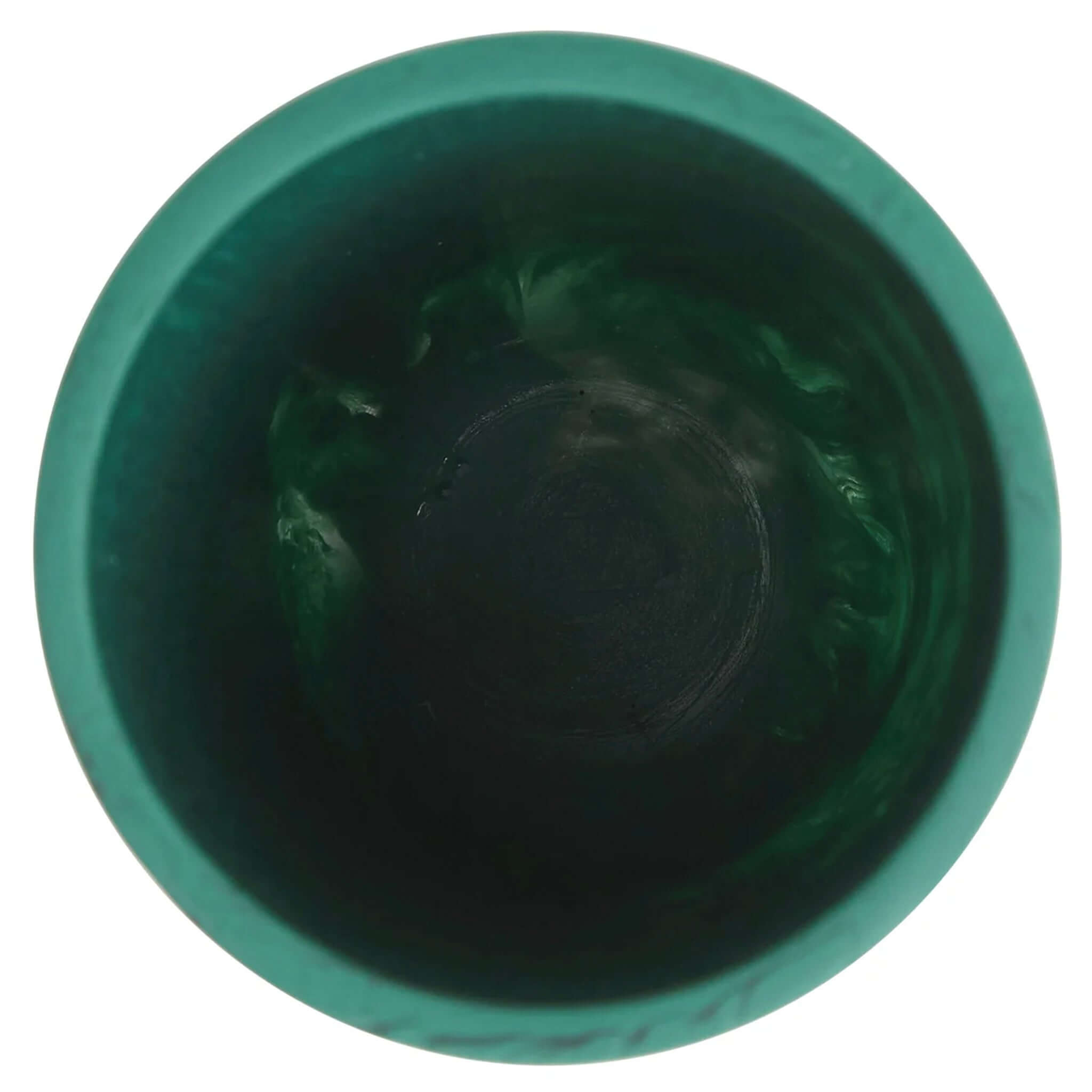 A green cylindrical vase, the Sage x Clare Kalinda Vase, with a textured surface.