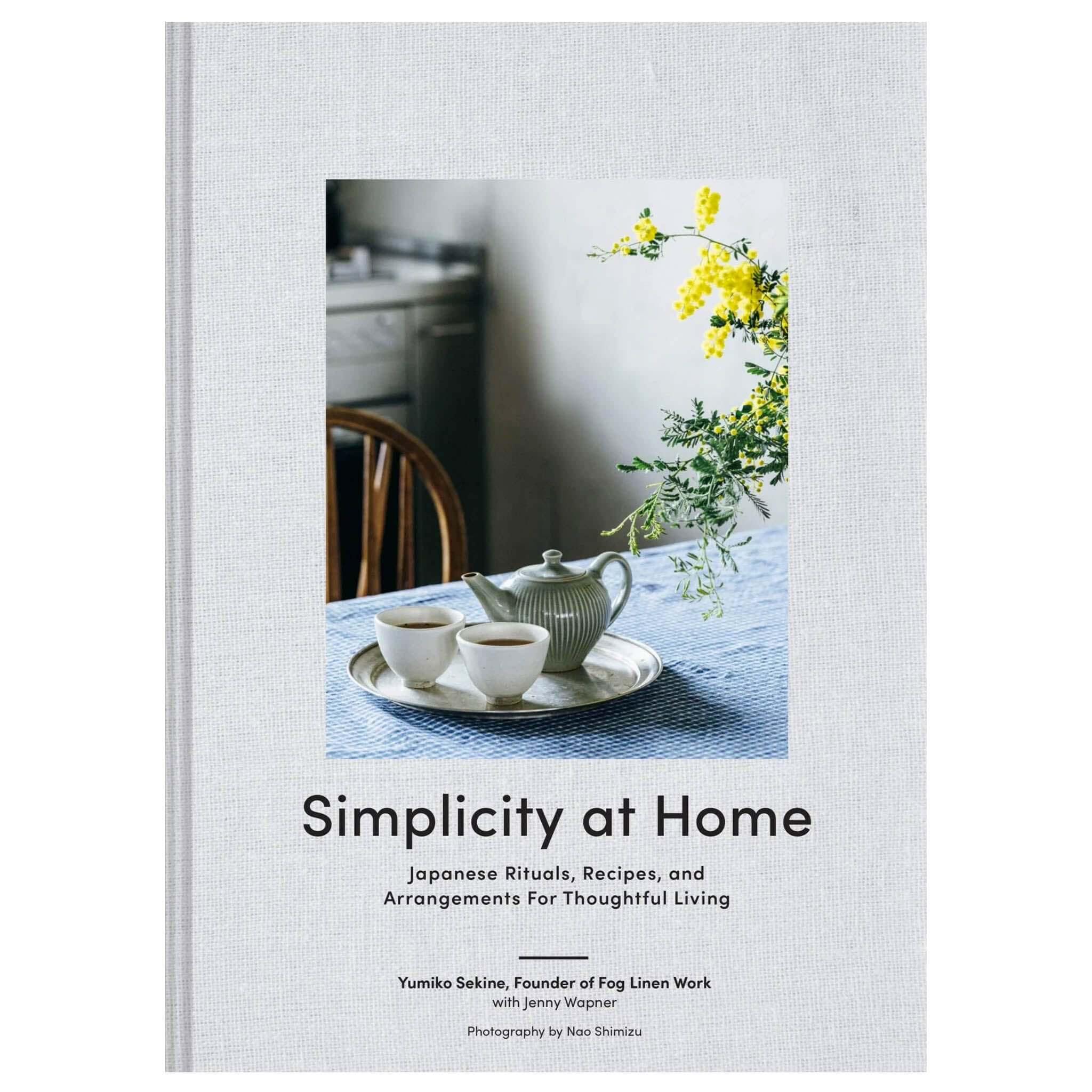 Alt Tag: Simplicity at Home: Japanese Rituals, Recipes and Arrangements for Thoughtful Living book cover with tea set and flowers