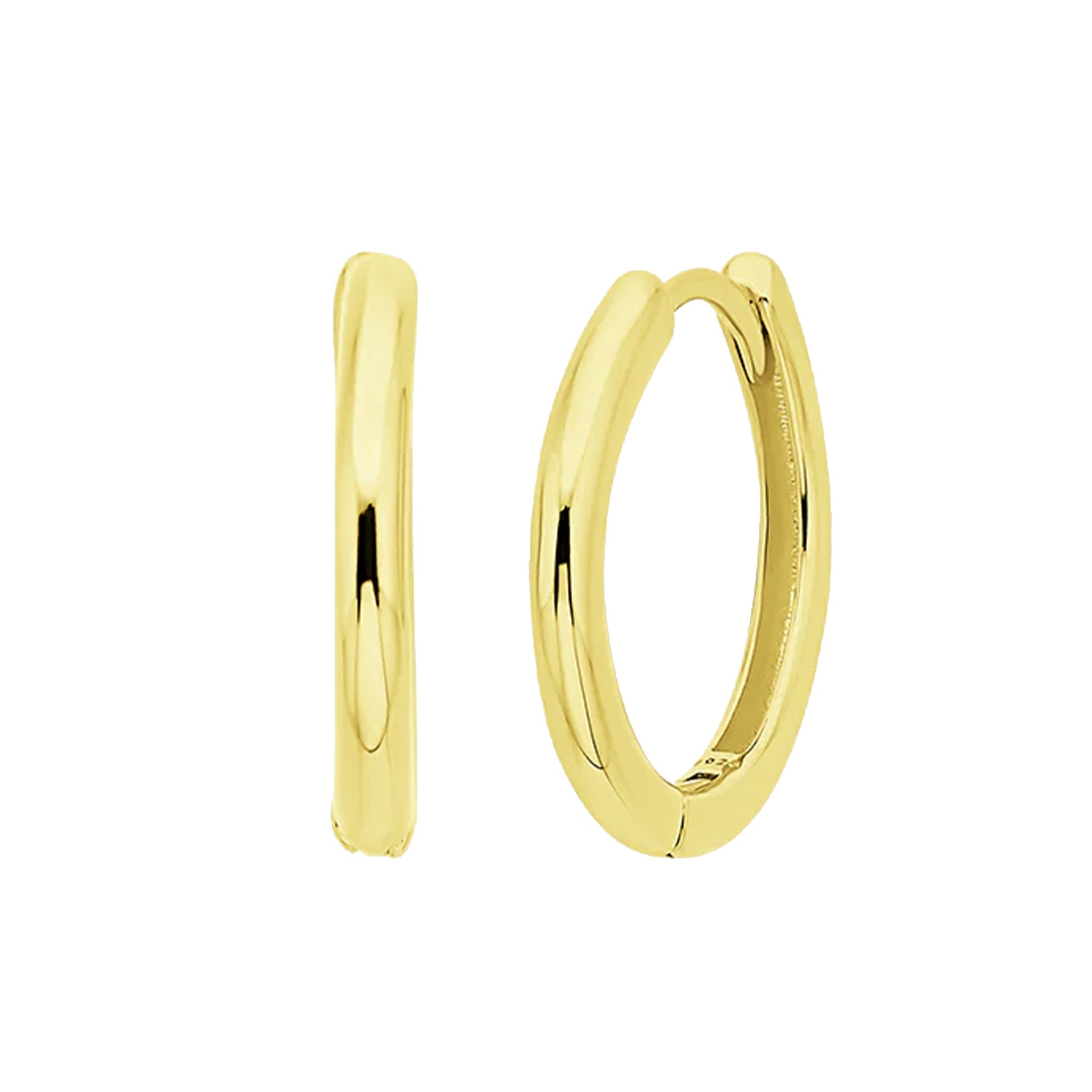 Gold hoop earrings on a white background