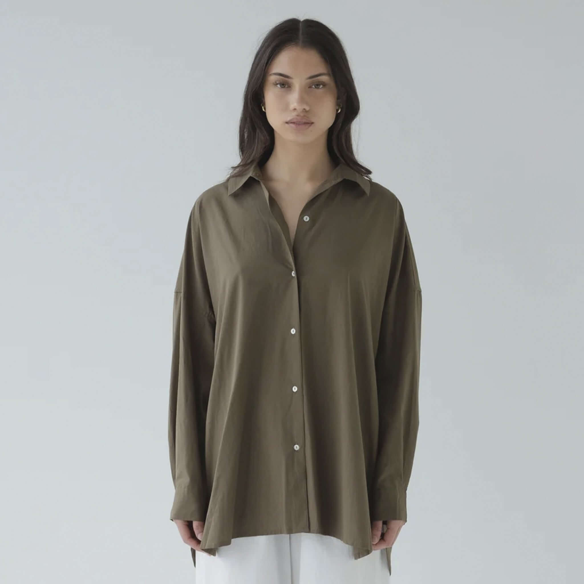 Sophie Love this Shirt - Forest oversized forest cotton shirt with curved hem, shell buttons and box pleat, model front view