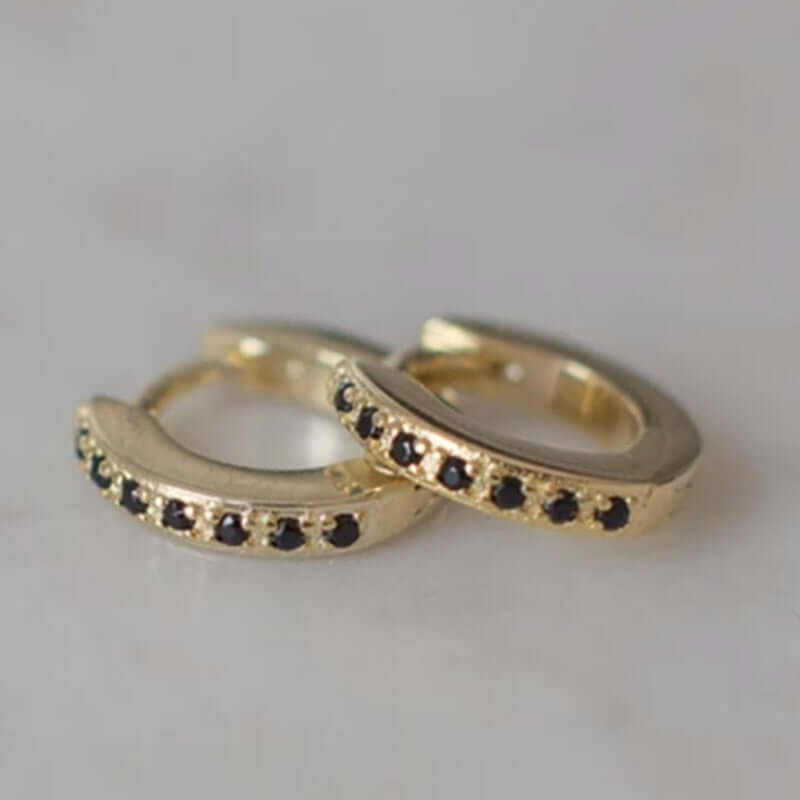 Sophie Mini Rock Black Huggie Earrings gold-plated huggie hoops with mini black zircon stones, 11mm delicate layered look
