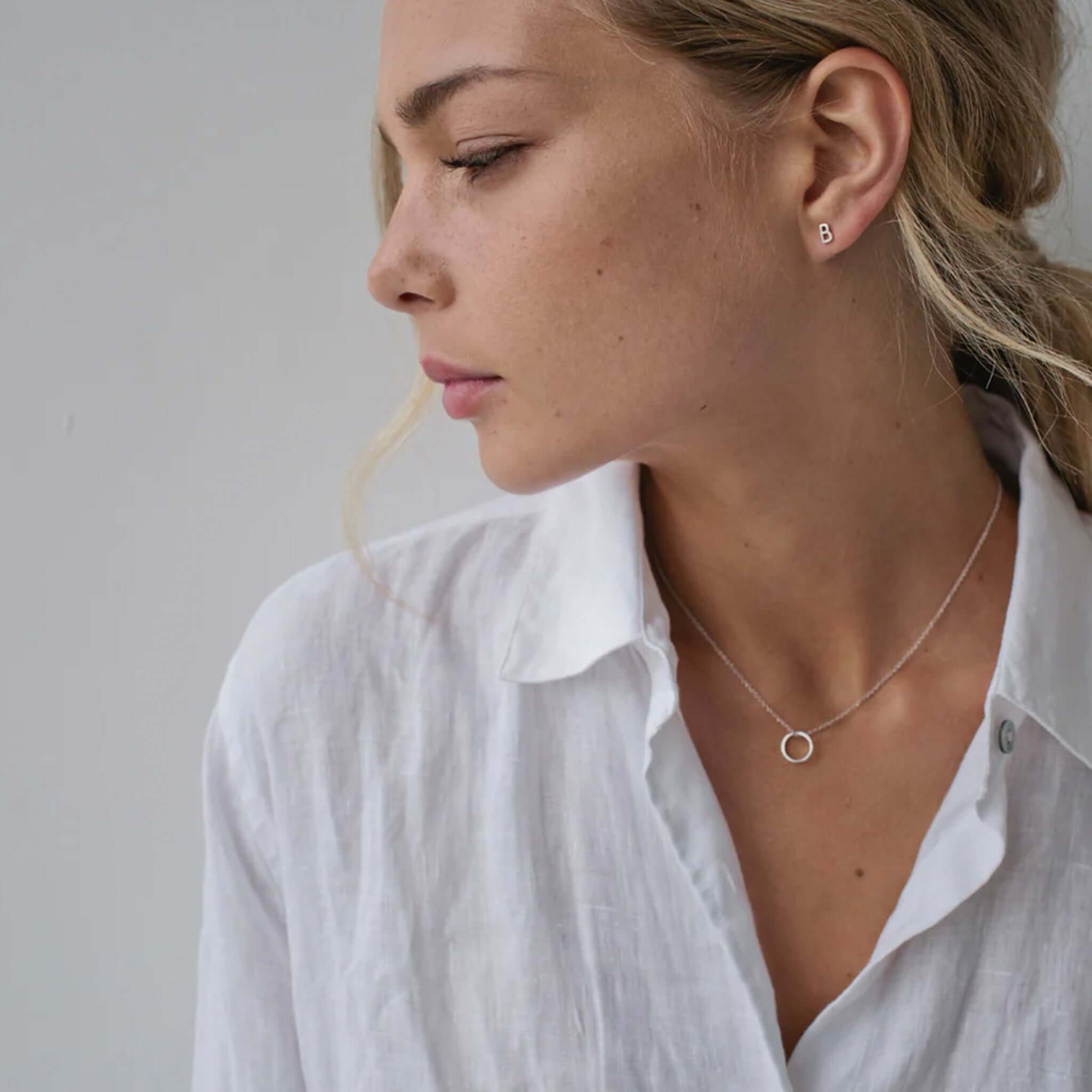 Sophie Letter Stud Earring - Sterling Silver initial stud earring worn in ear, minimalist personalised letter jewellery gift