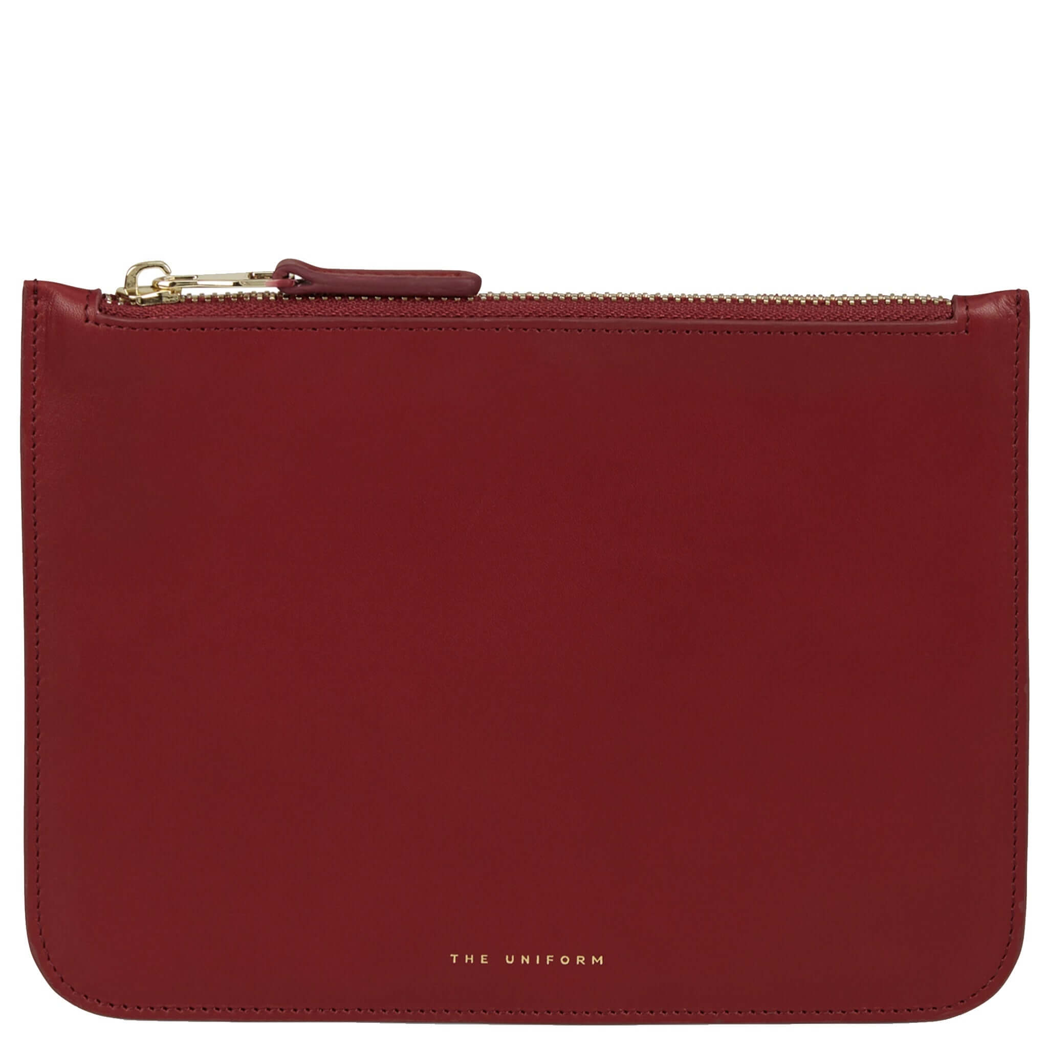Alt Tag: The Uniform Pouch - Margaux full-grain calf leather zip-top purse in margaux with navy lining and gold zipper