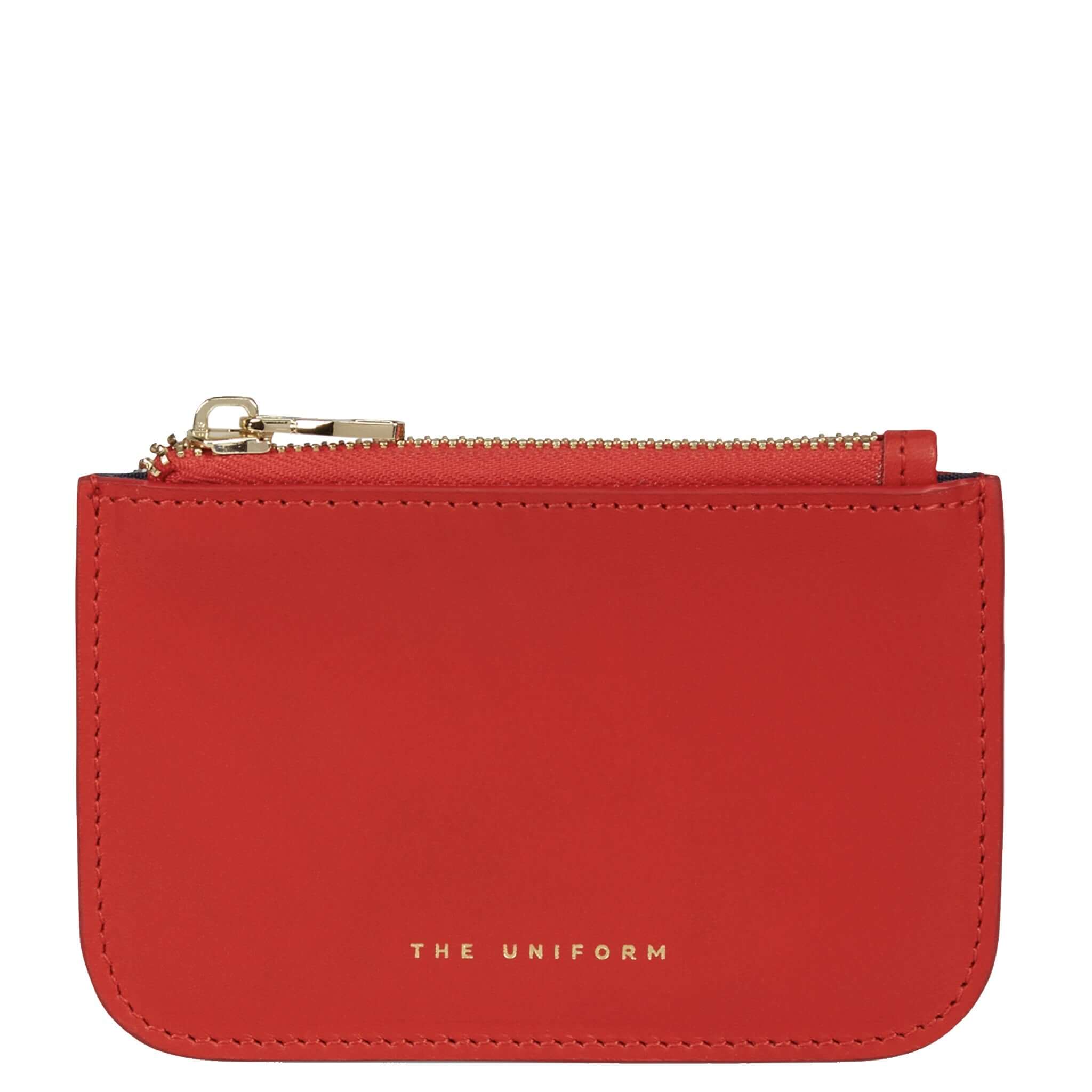 Alt Tag: The Uniform Wallet - Fire full-grain calf leather fire red zip-top wallet with gold zipper and navy lining by The Uniform London