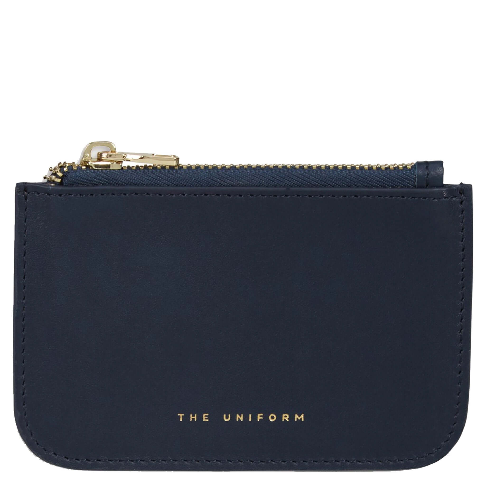 Alt Tag: The Uniform Wallet - Navy full-grain calf leather zip top wallet in navy with gold zipper, minimalist London design