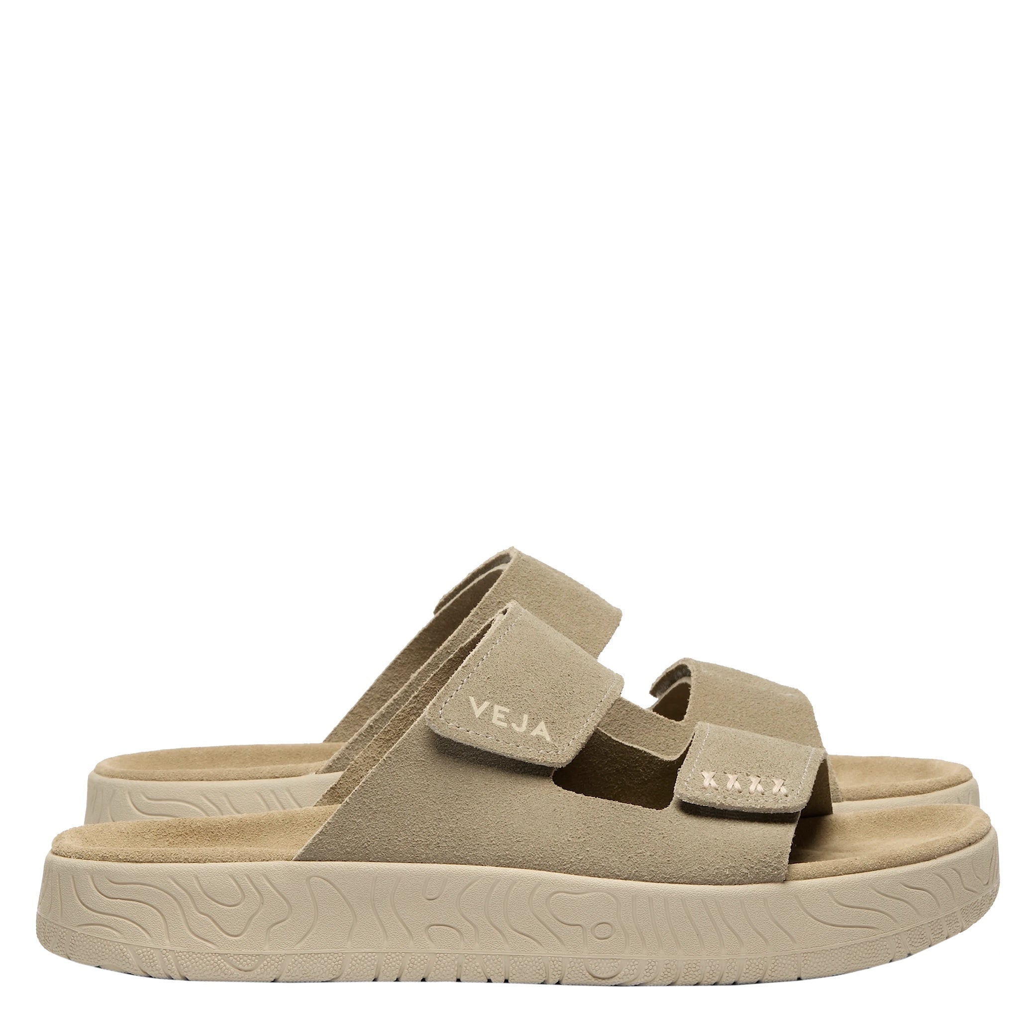 Beige sandals with 'Veja' branding on a white background