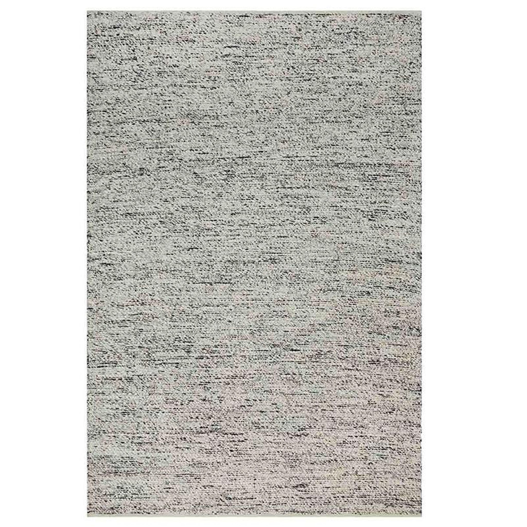 Textured gray rug on a white background