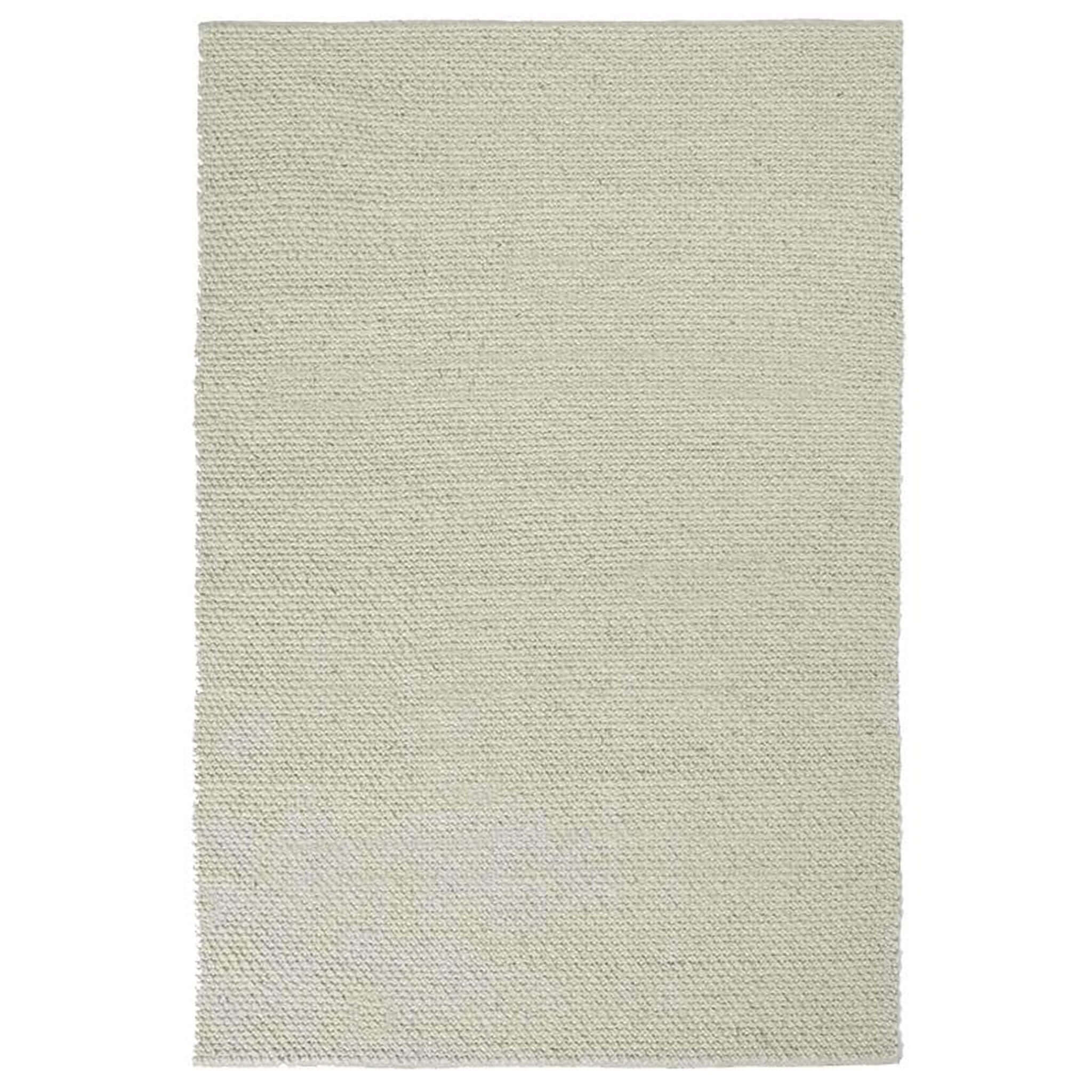 Light gray woven rug on a white background