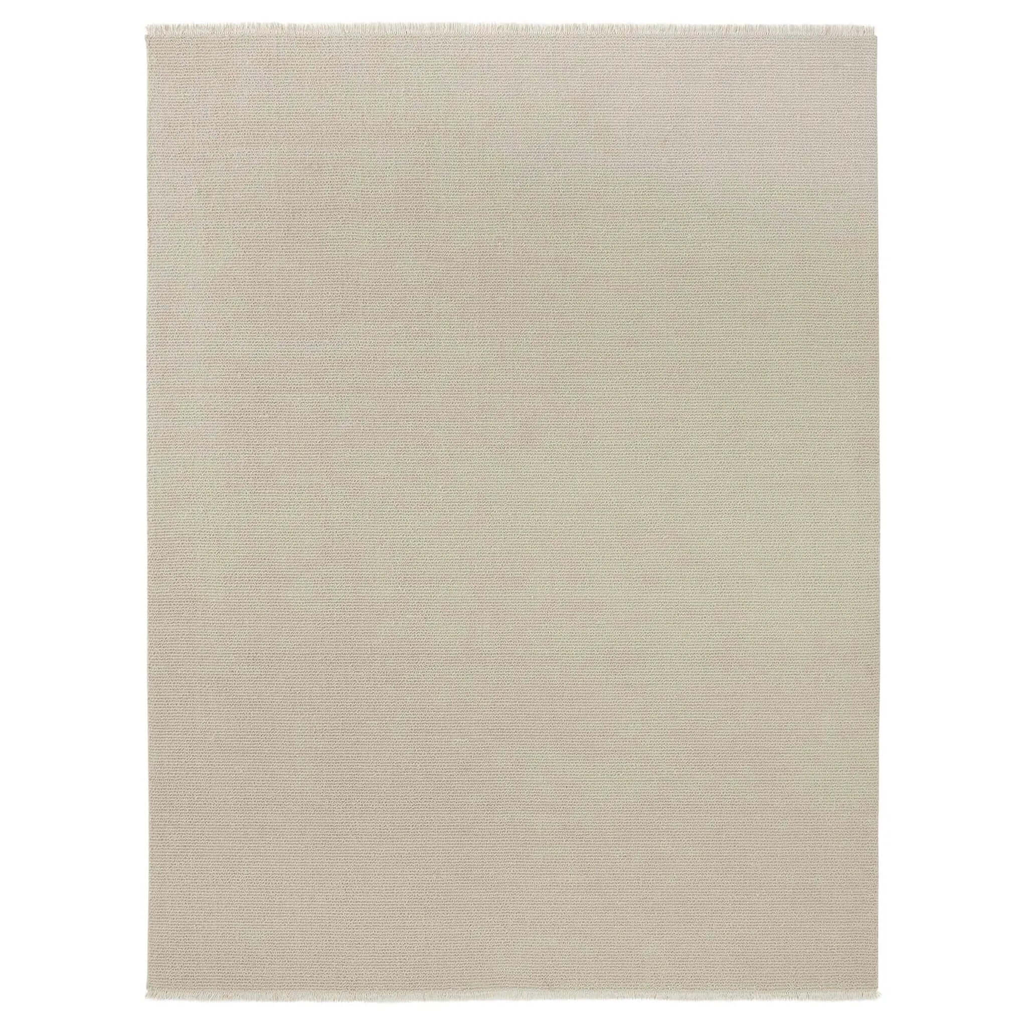 Beige rug on a white background