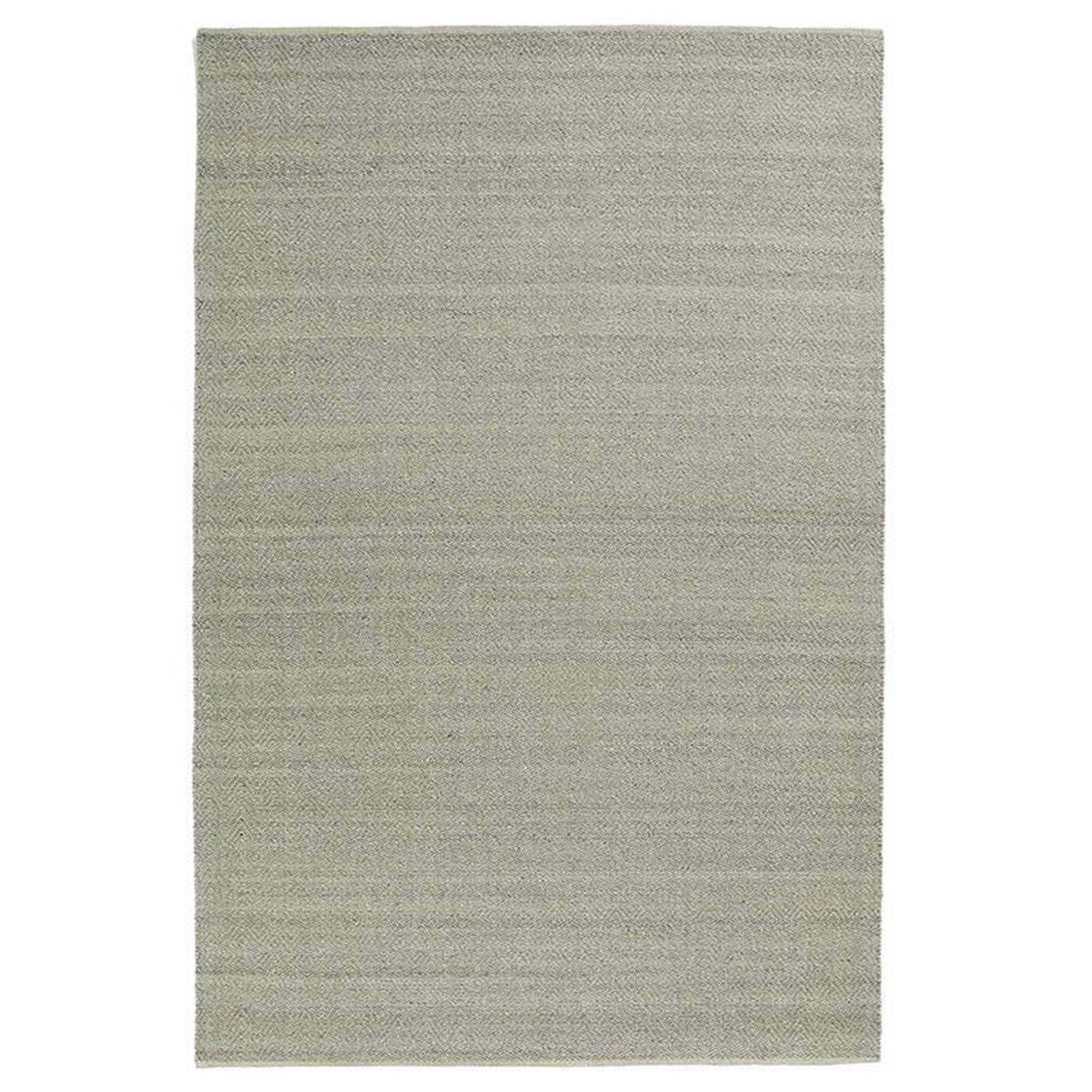 Beige rug on a white background.