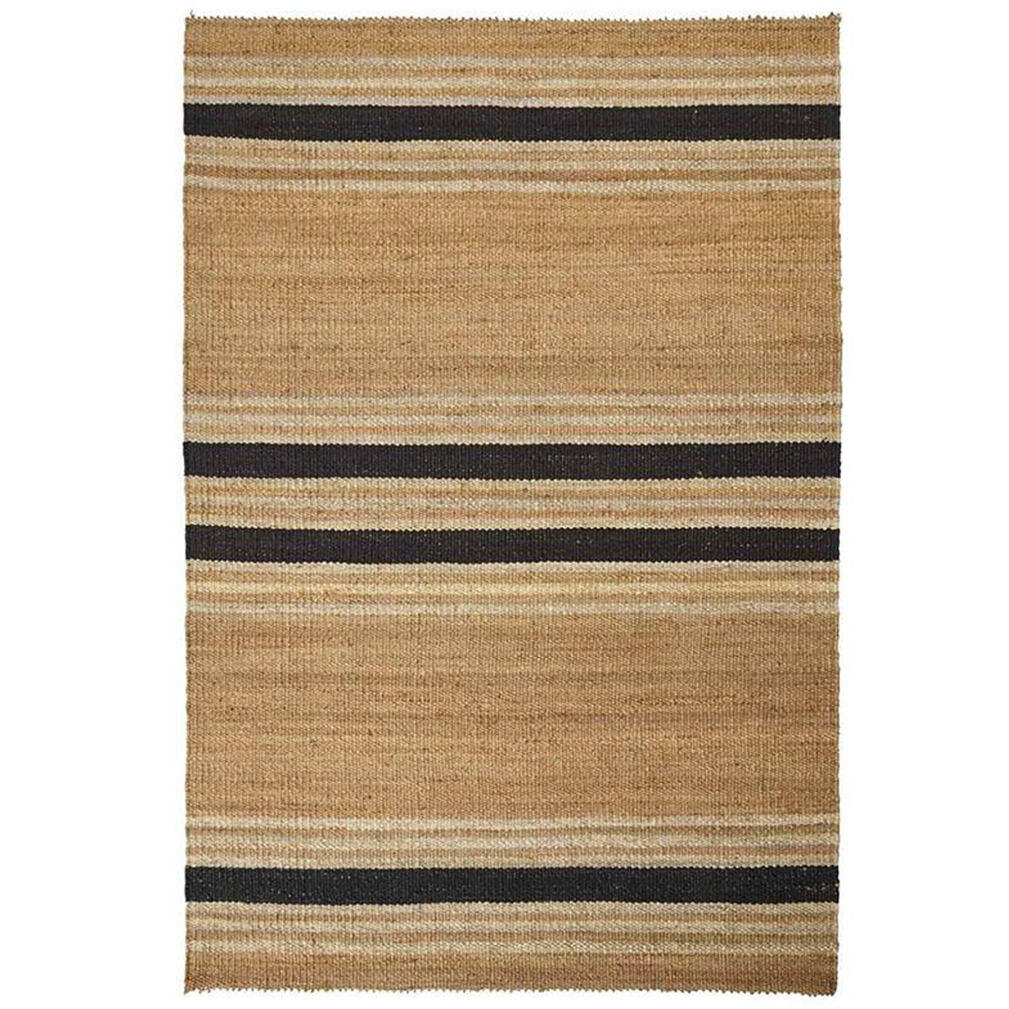 Beige and black striped rug on a white background