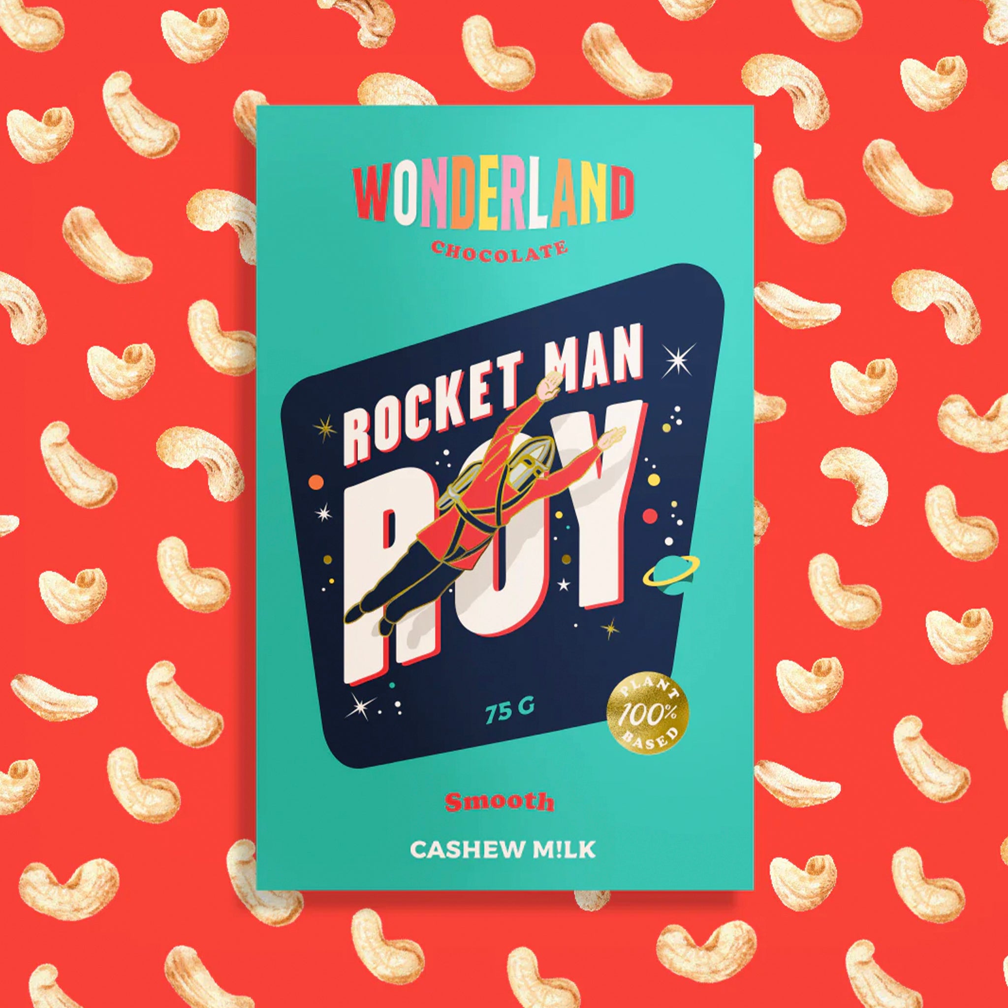 Chocolate bar packaging with 'Rocket Man Roy' on a red background with cashew nut pattern