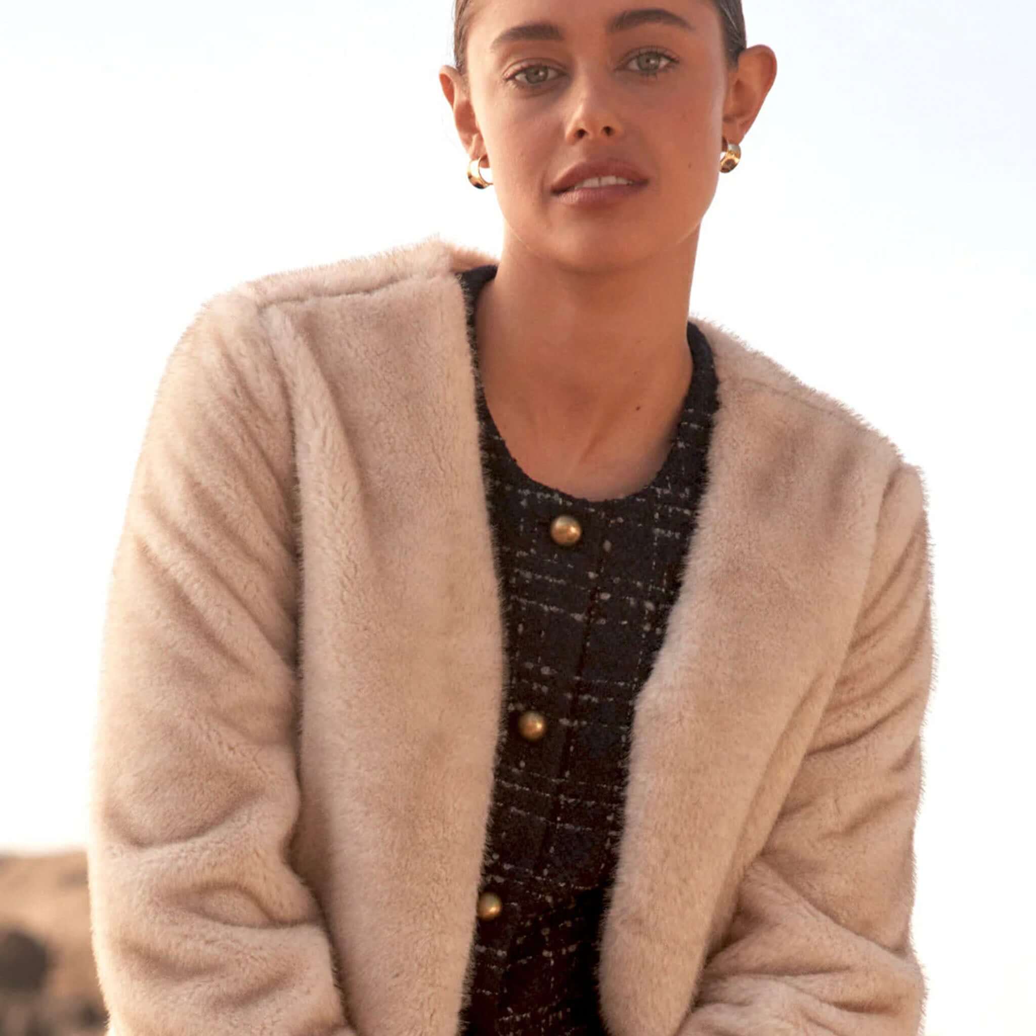 Alt Tag: Zoe Kratzmann Dune Jacket - Ecru plush faux fur cropped V-neck winter jacket styled over black buttoned top