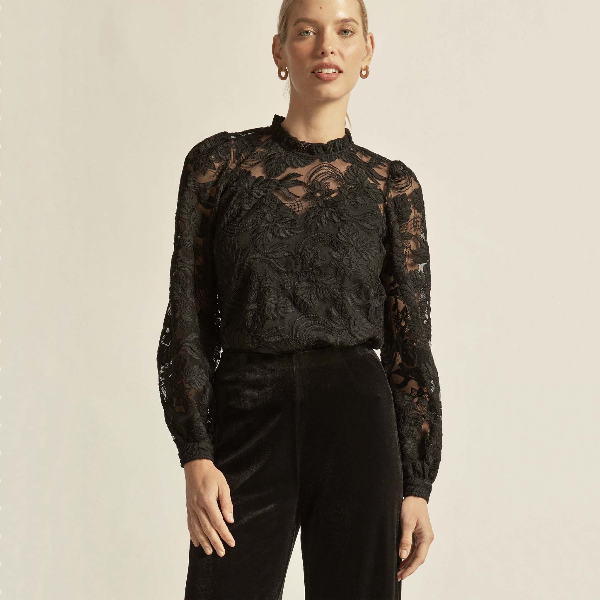 Alt Tag: Zoe Kratzmann Glint Top - Black lace long sleeve frill neckline top, elegant fitted silhouette