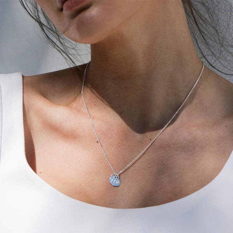 Alt Tag: Kirstin Ash Bespoke Collection Oval Initials - Sterling Silver sterling silver oval initial charm necklace on model