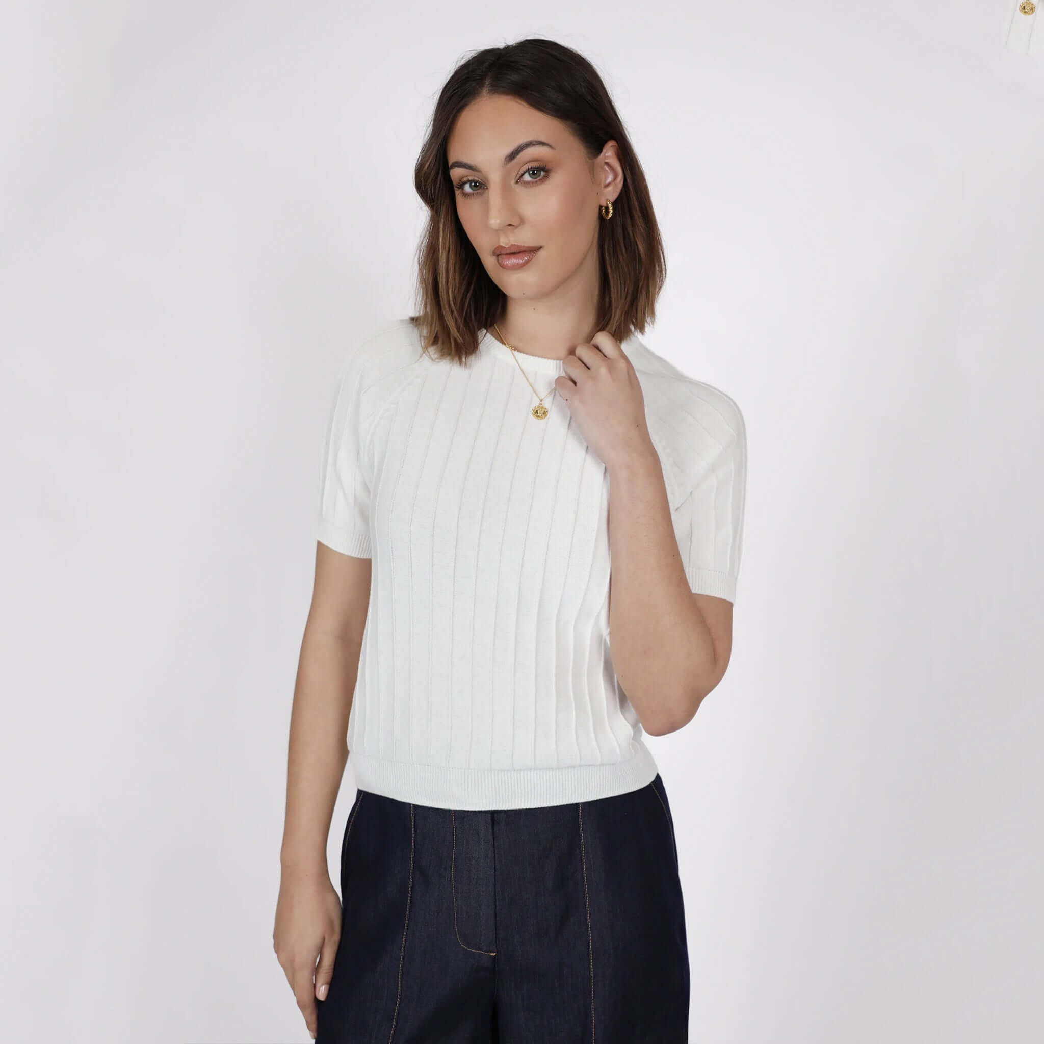 Marlow Soleil Knit Tee - Ivory worn by model featuring a relaxed fit and ribbed texture.