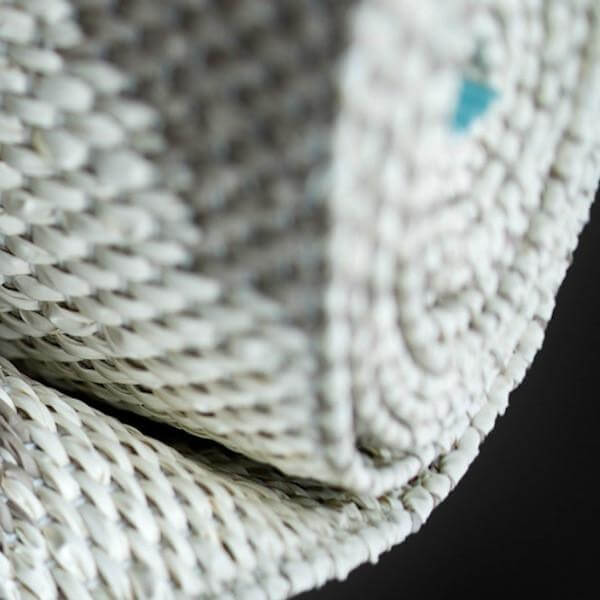 Alt Tag: Pappelina Sweden Noa Reversible Mat - Warm Grey & Vanilla close-up of woven reversible rug edge in warm grey and vanilla