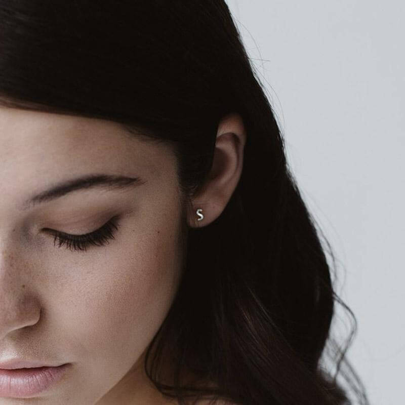 Alt Tag: Sophie Letter Stud Earring - Sterling Silver initial S stud earring worn in ear, minimalist personalised letter jewellery gift