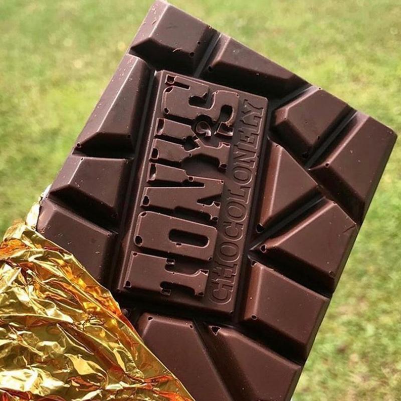 Tony's Chocolonely chocolate bar packaging on a white background