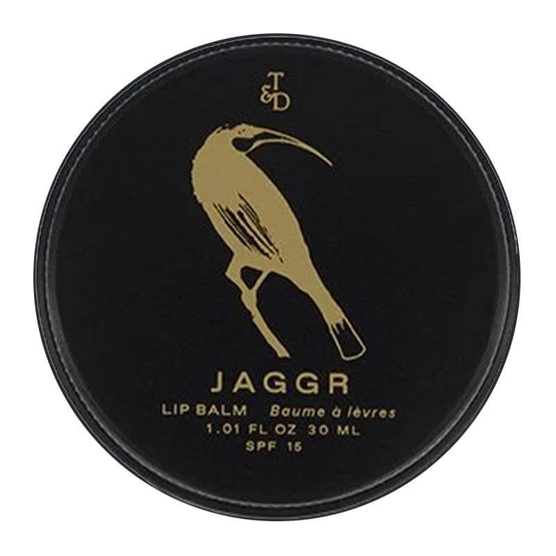 Alt Tag: Triumph & Disaster Jaggr Lip Balm tin lid with gold bird logo, SPF 15 soothing lip balm with Kawakawa and Manuka 30ml