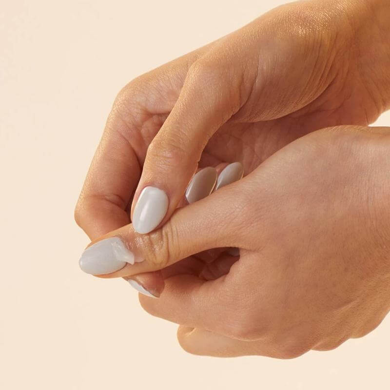 Ashley & Co Better Balm Skin Conditioner - Dew Bud applied to hands, nourishing multi-tasking balm for extra hydration and dewy glow