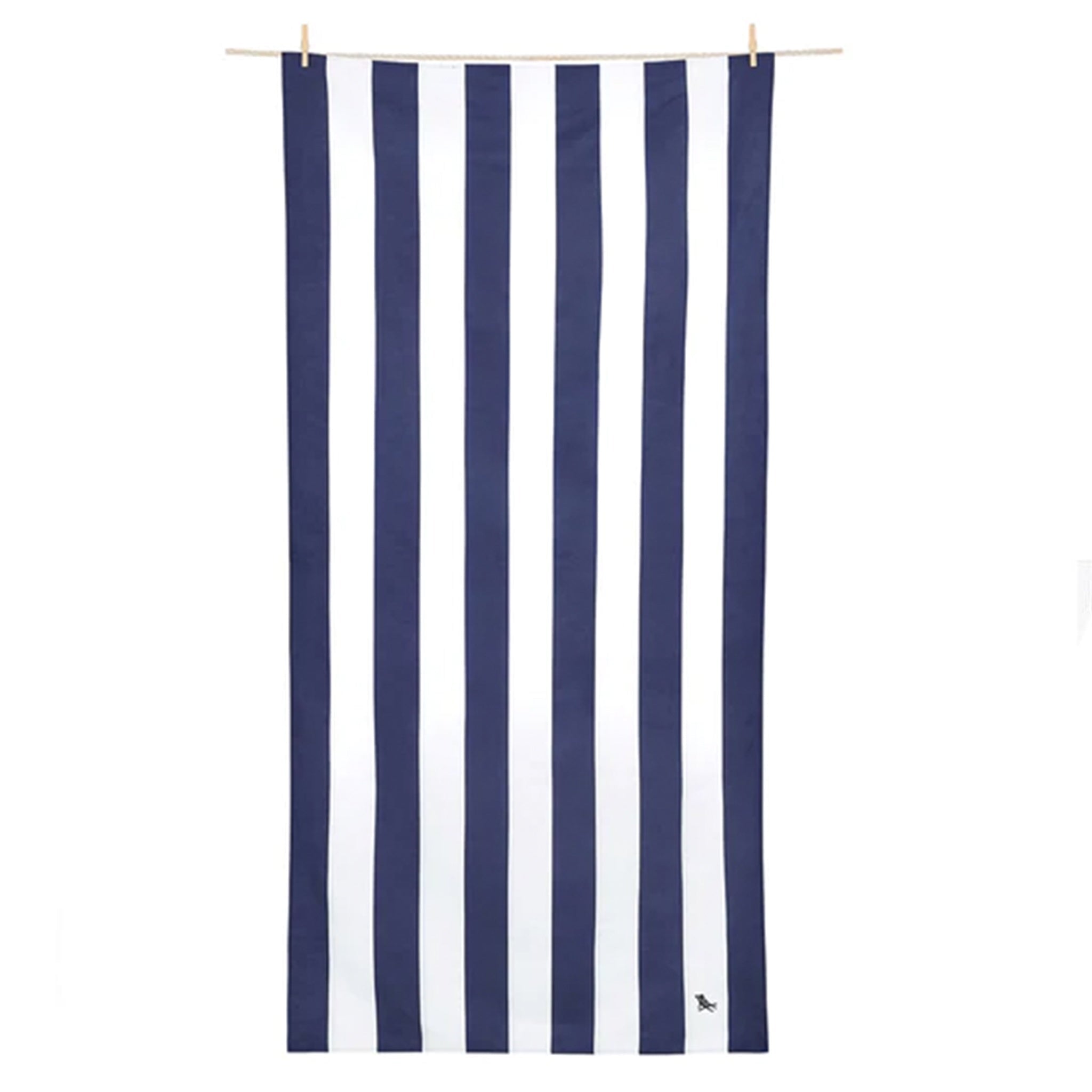 A striped beach towel hanging on a rod, with blue vertical stripes on a white background.