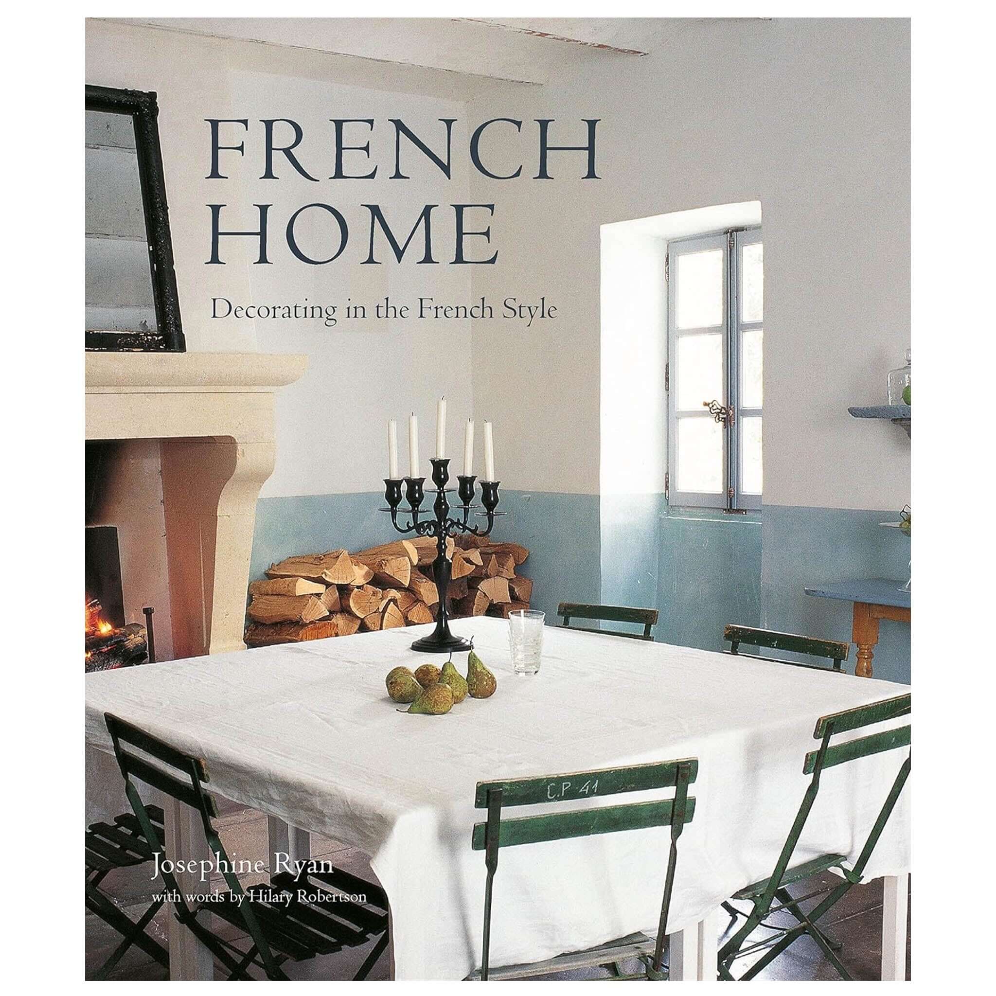 Alt Tag: French Home: Decorating in the French Style book cover featuring a French-style dining room with rustic table, chairs, and fireplace