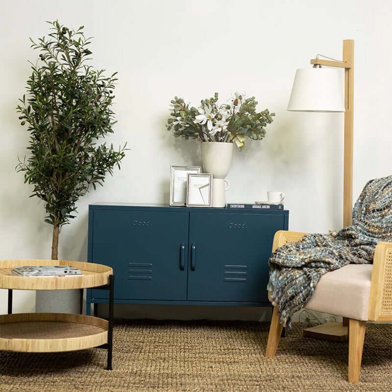 Alt Tag: Good. Harold Contemporary Metal Locker low TV console in modern living room with decor, floor lamp, chair and greenery