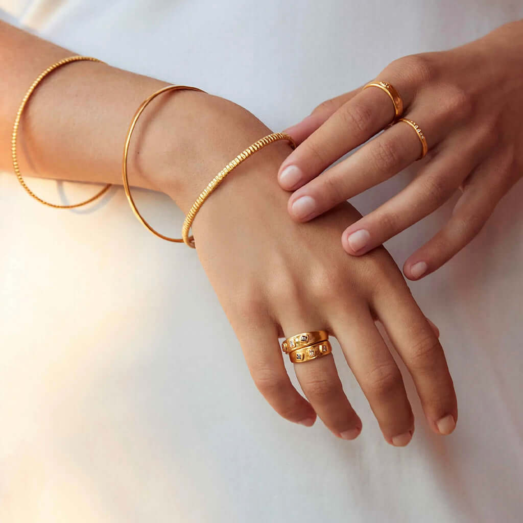 Alt Tag: Kirstin Ash Sun Lines Collection - Sun Dance Ring gold vermeil stacking ring with ochre crystals on hand