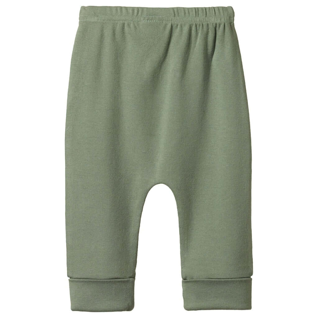 Alt Tag: Nature Baby Organic Cotton Drawstring Pants - Nettle in nettle green, GOTS-certified organic cotton baby pants with elastic waist and cuffed legs