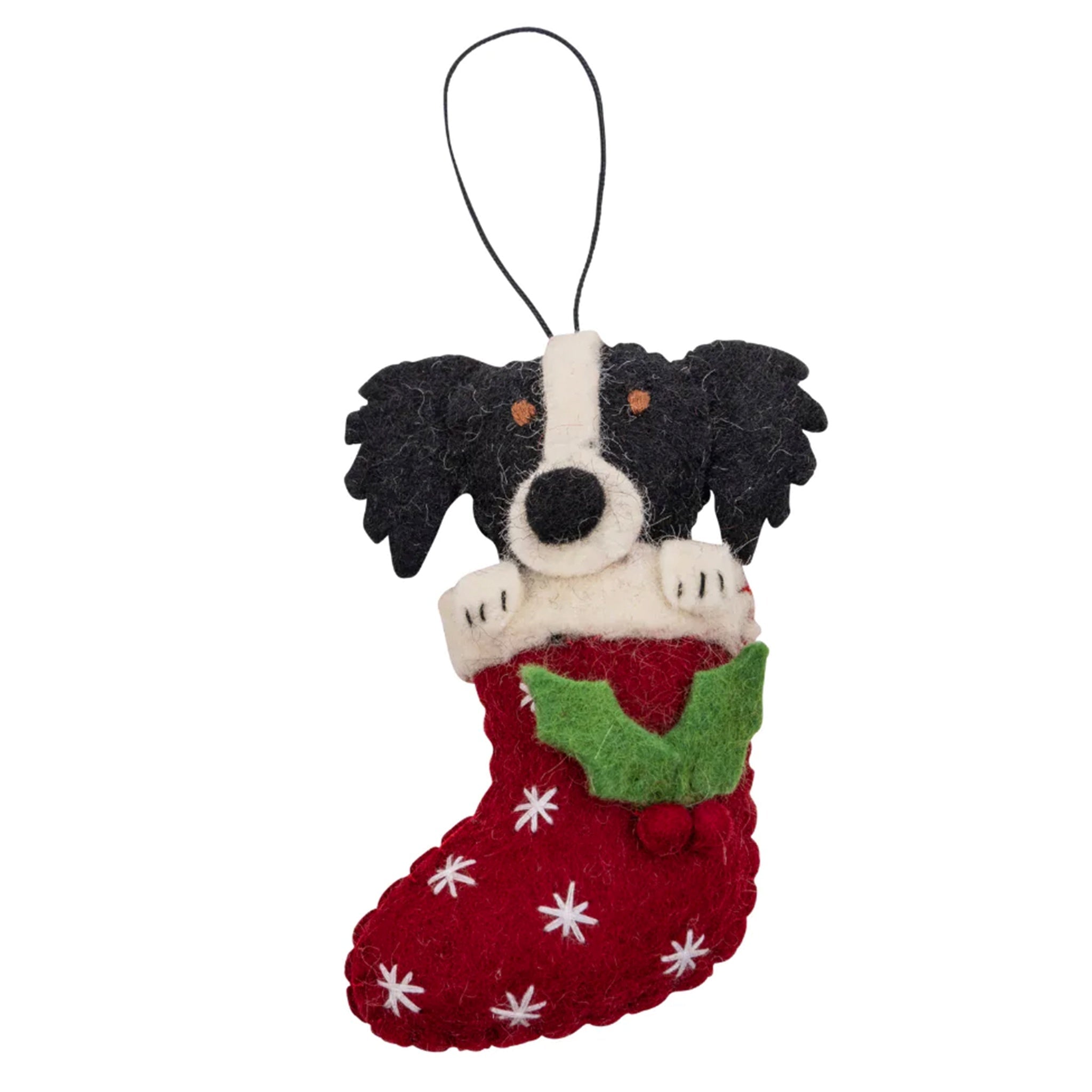 Felt border collie dog ornament in a red stocking on a white background