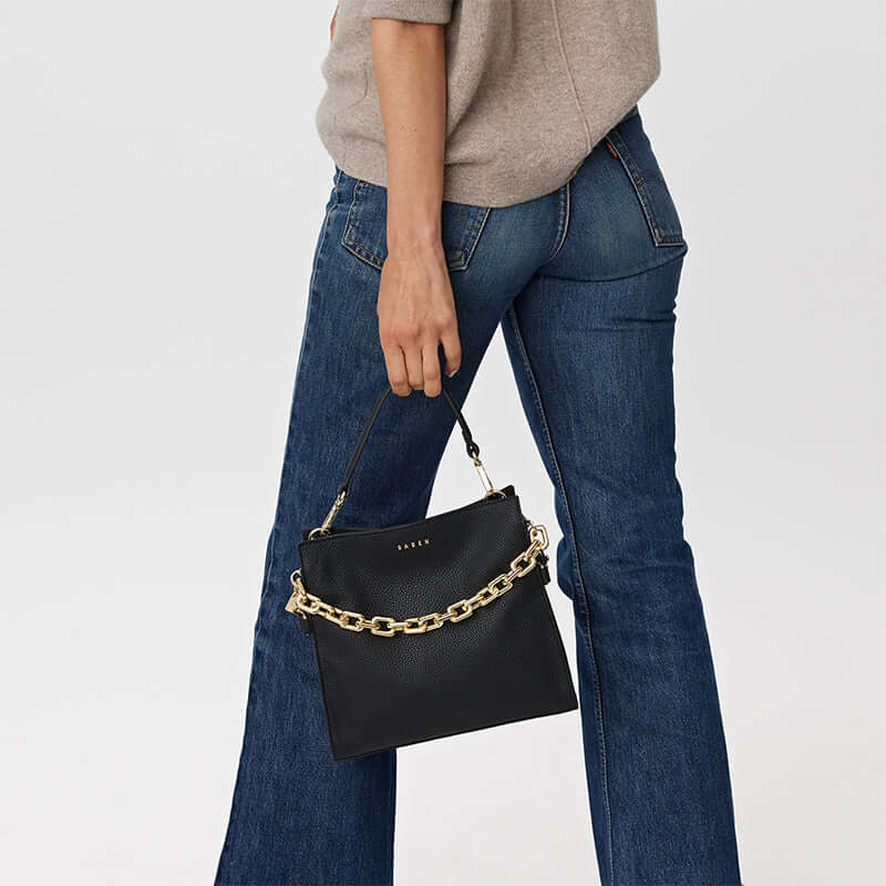 Saben Feature Chain Handle - Gold Chunky on black Saben bag, gold chunky chain strap worn as handle on shoulder bag