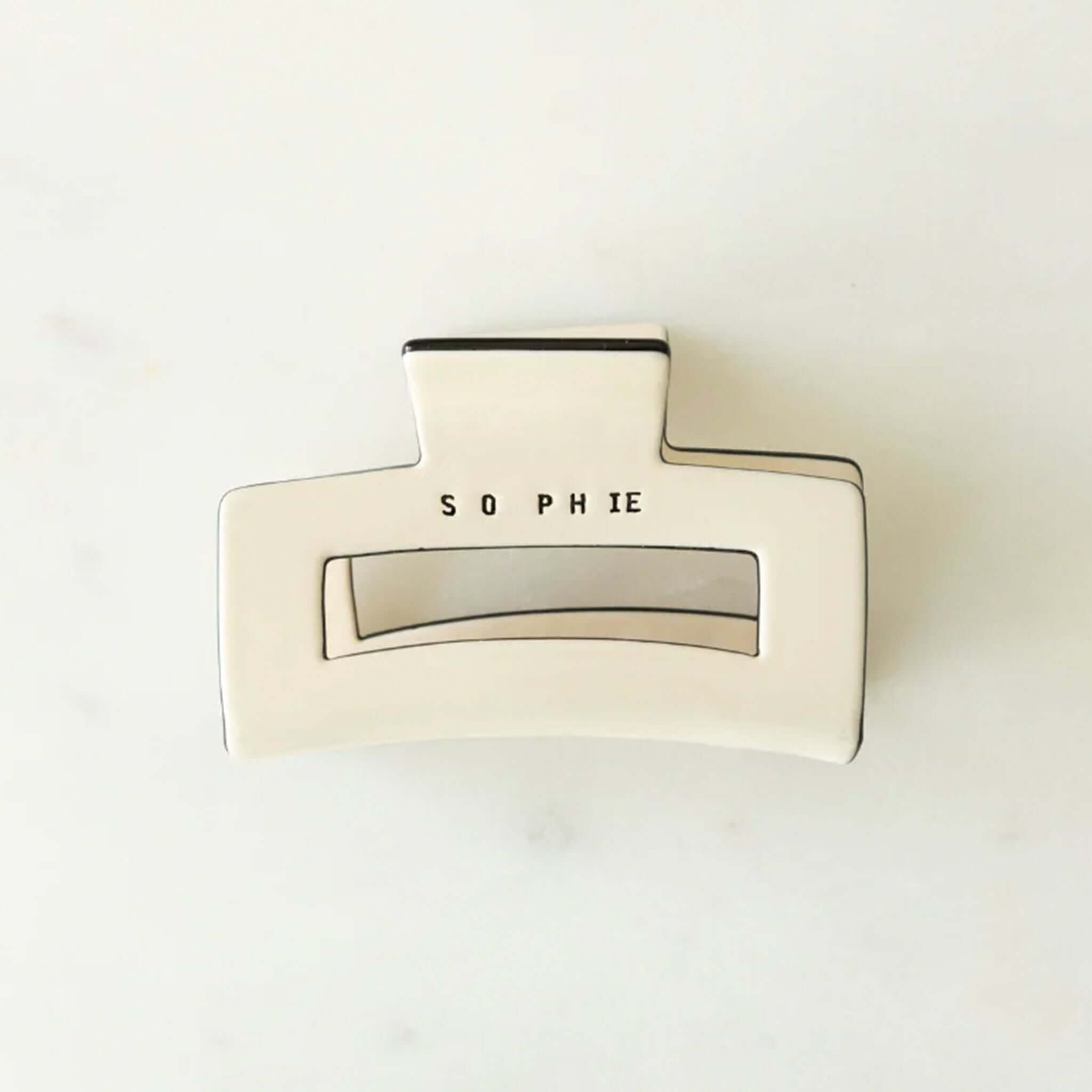 Alt Tag: Sophie Claw Clip Medium - Ivory acetate hair claw clip, medium size, 3cm x 8cm, SOPHIE logo