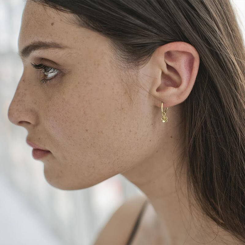 Sophie Sleeper Earrings - Daisy Day 14kt gold plated sterling silver 10mm sleepers with daisy pendant on ear