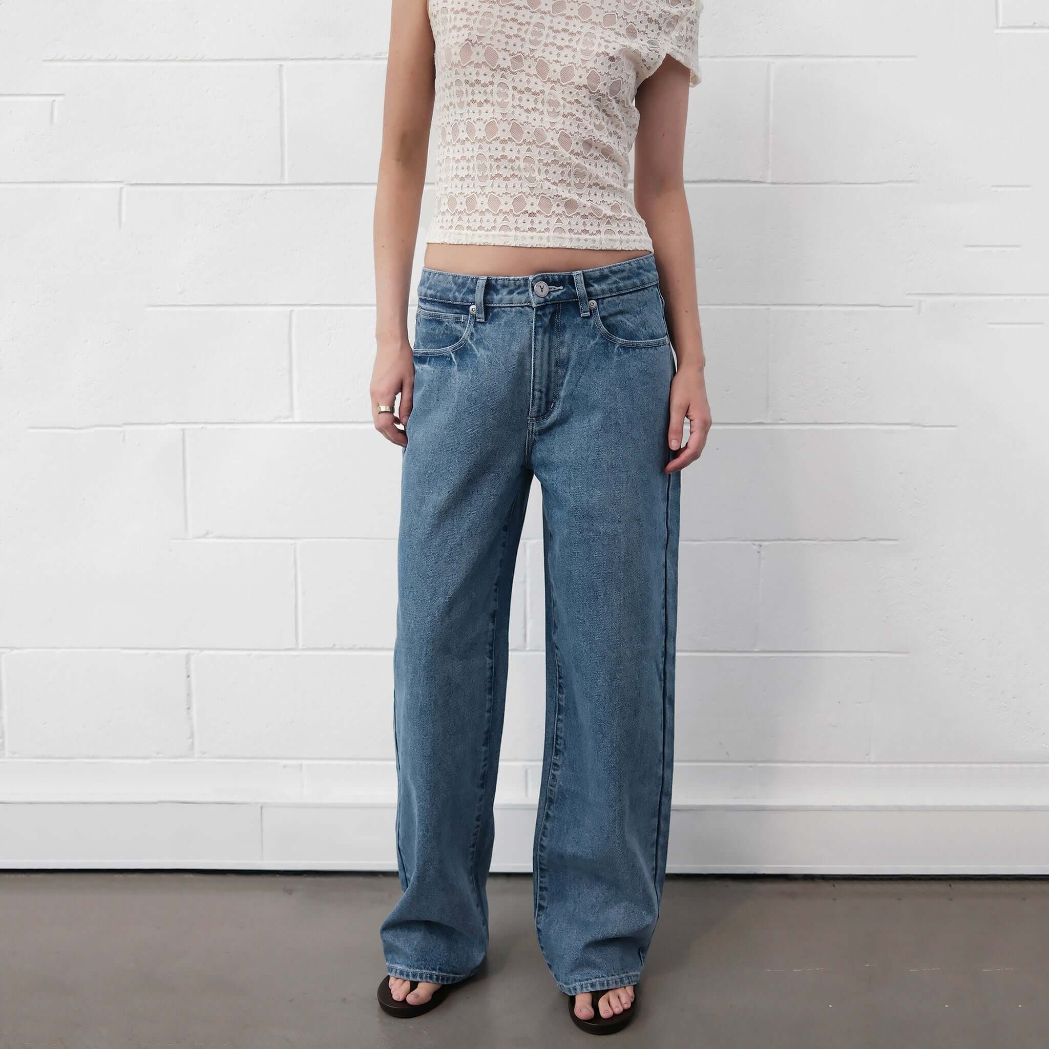Alt Tag: Abrand 95 Mid Baggy Jeans - Selena bright blue vintage stonewash mid-rise wide straight leg baggy denim jeans front view