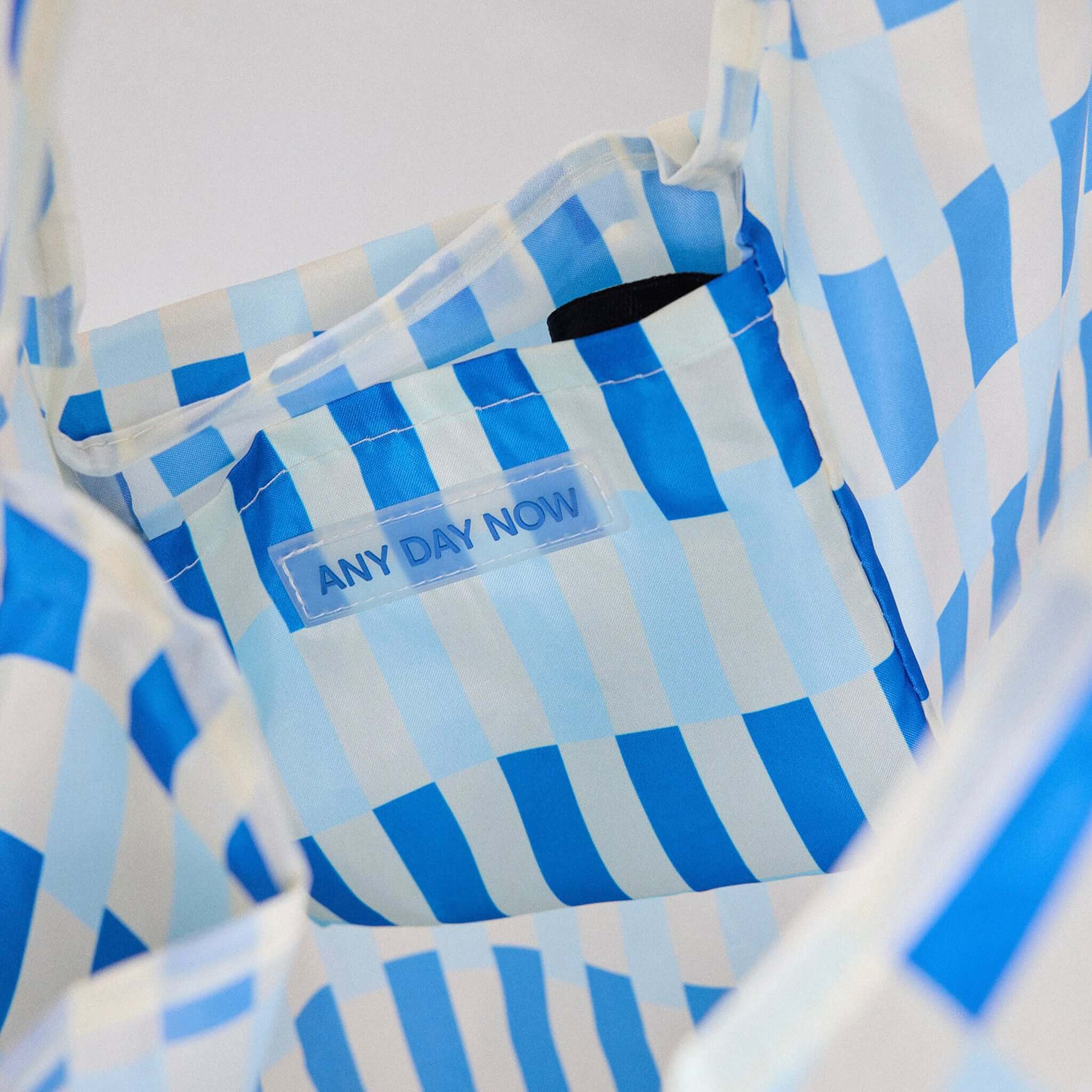 Any Day Now Any Where Tote - Blue & White interior with logo and blue stripe design.