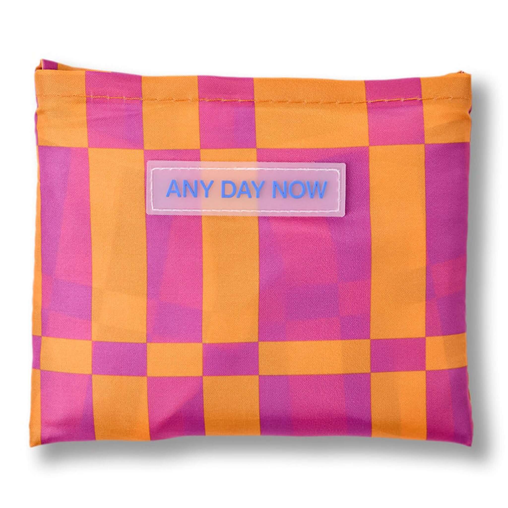 Any Day Now Any Where Tote - Orange & Purple folded pouch with a graphic design in orange and pink.