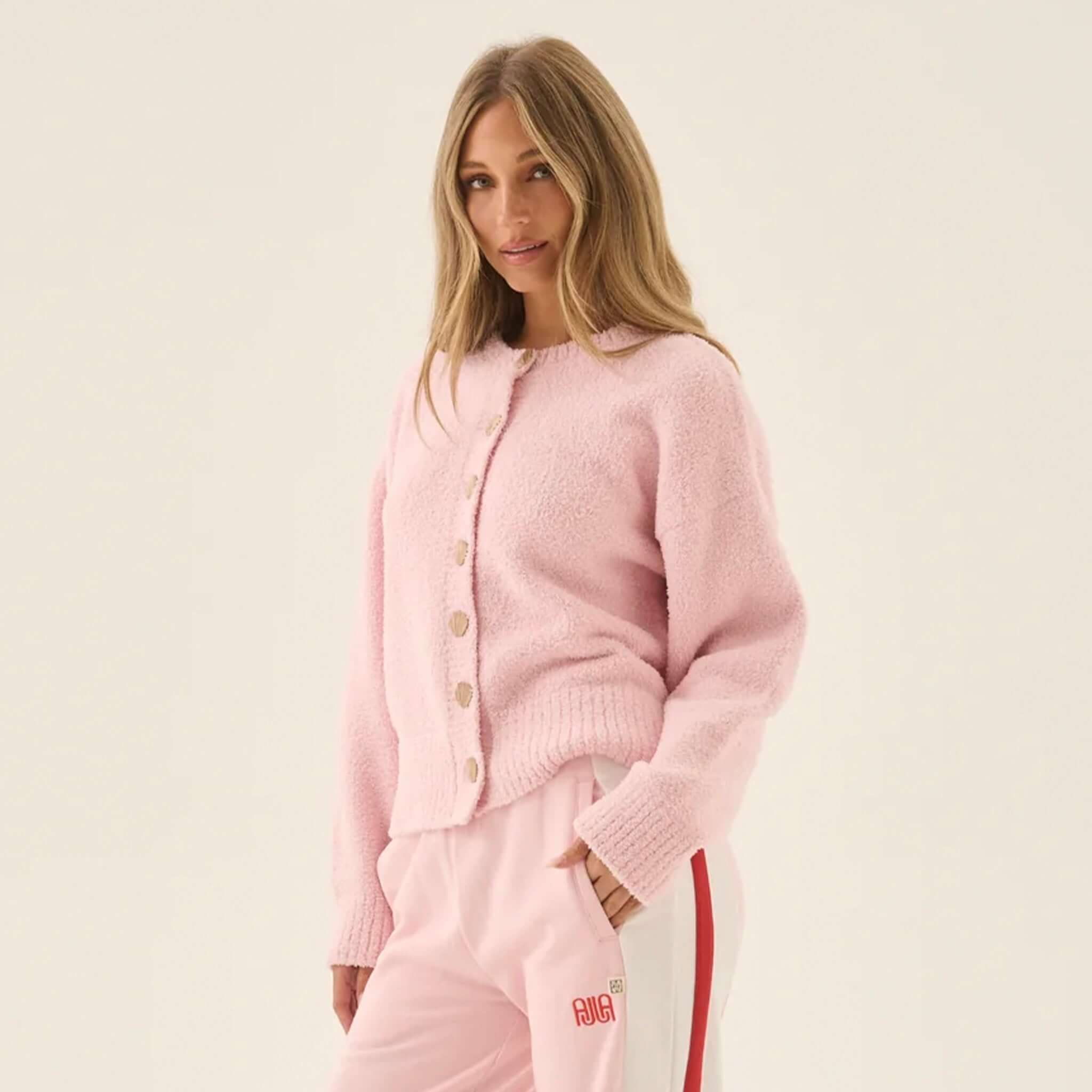 Araminta James Aimes Shell Cardigan - Ballet Pink on model, featuring fluffy knit and gold shell buttons.
