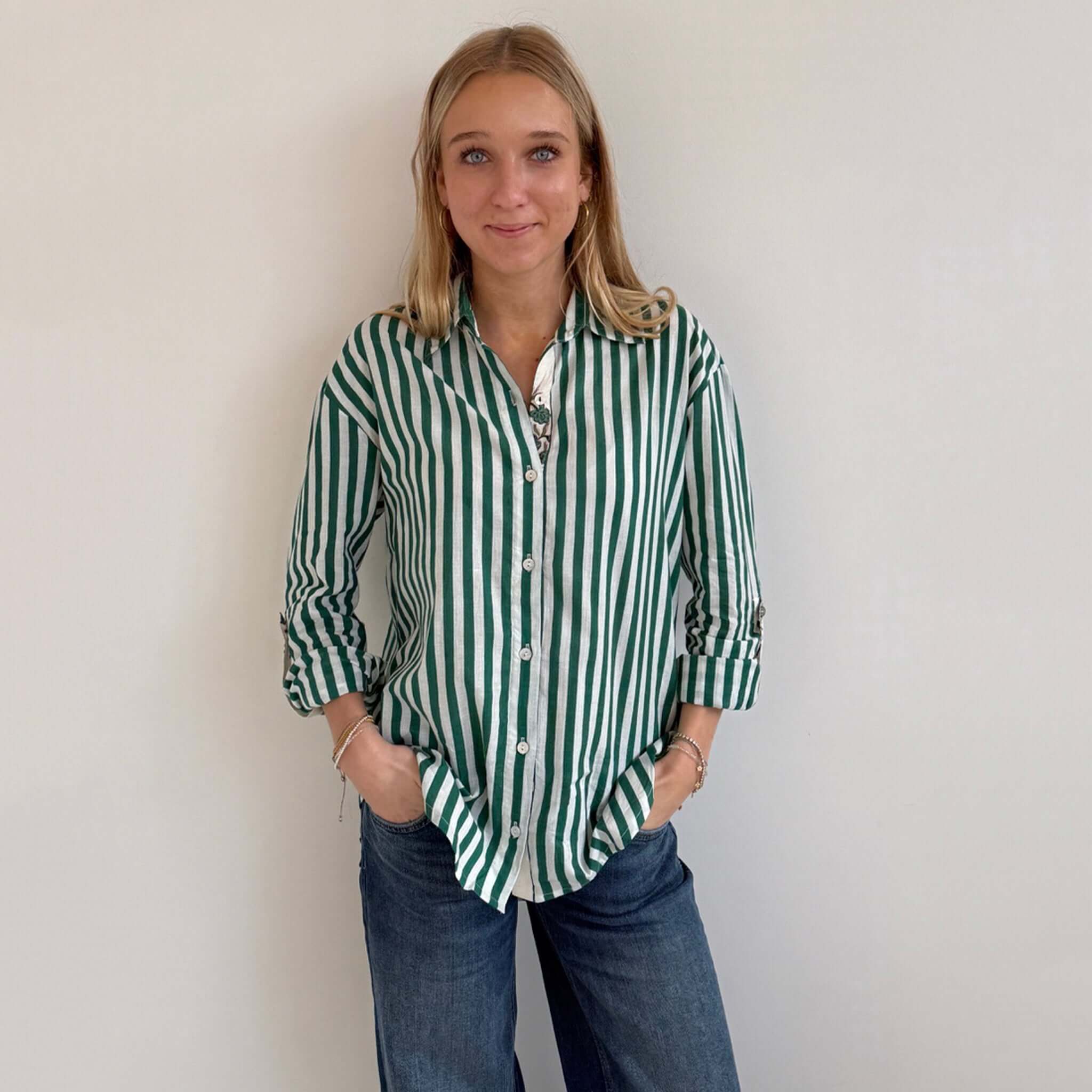 Art In My Wardrobe Annie Shirt - Green worn by a model, featuring bold green and white stripes.