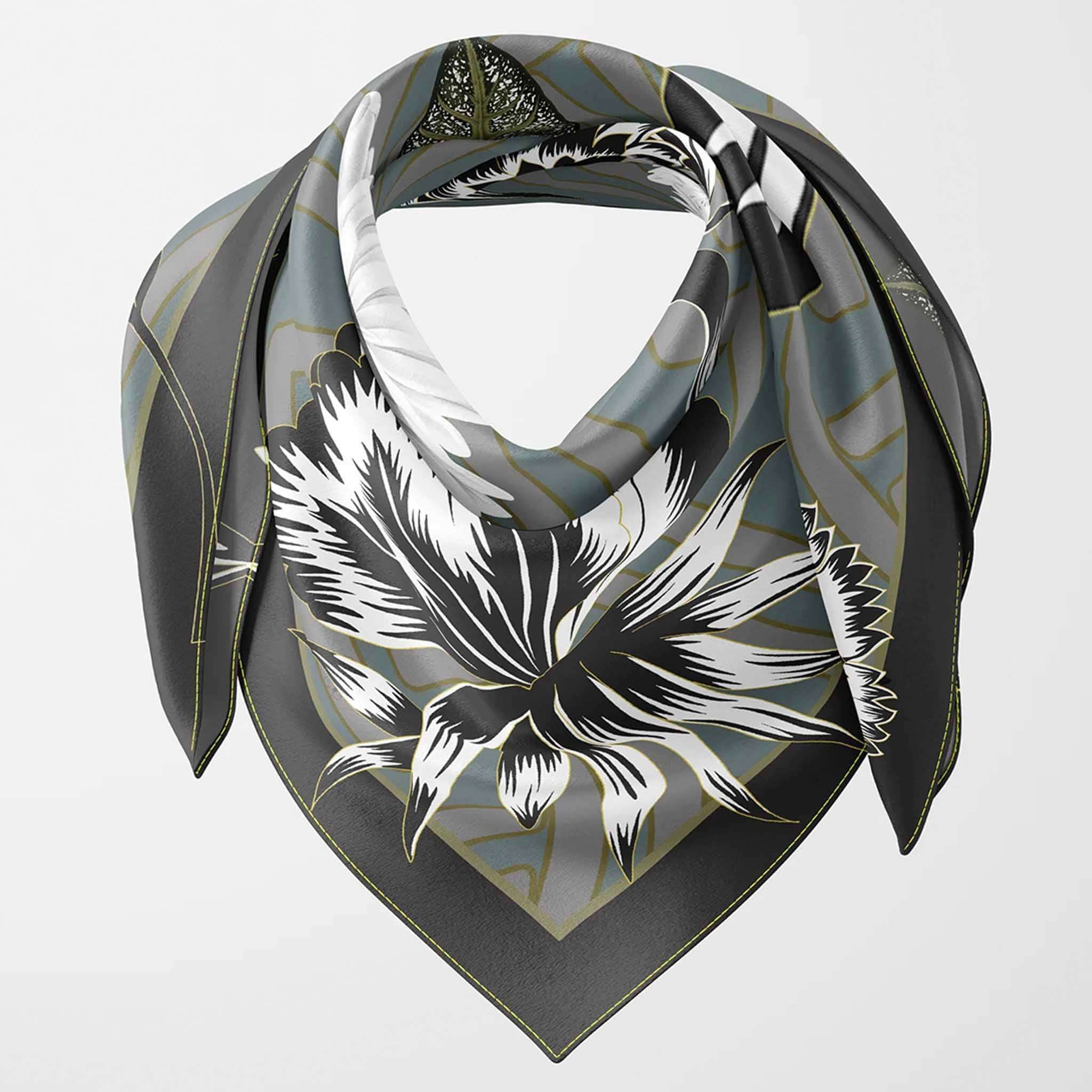 Alt Tag: Artifact Square Silk Scarf - Silva Noire square silk scarf with monochrome floral and foliage print on green-grey geometric background