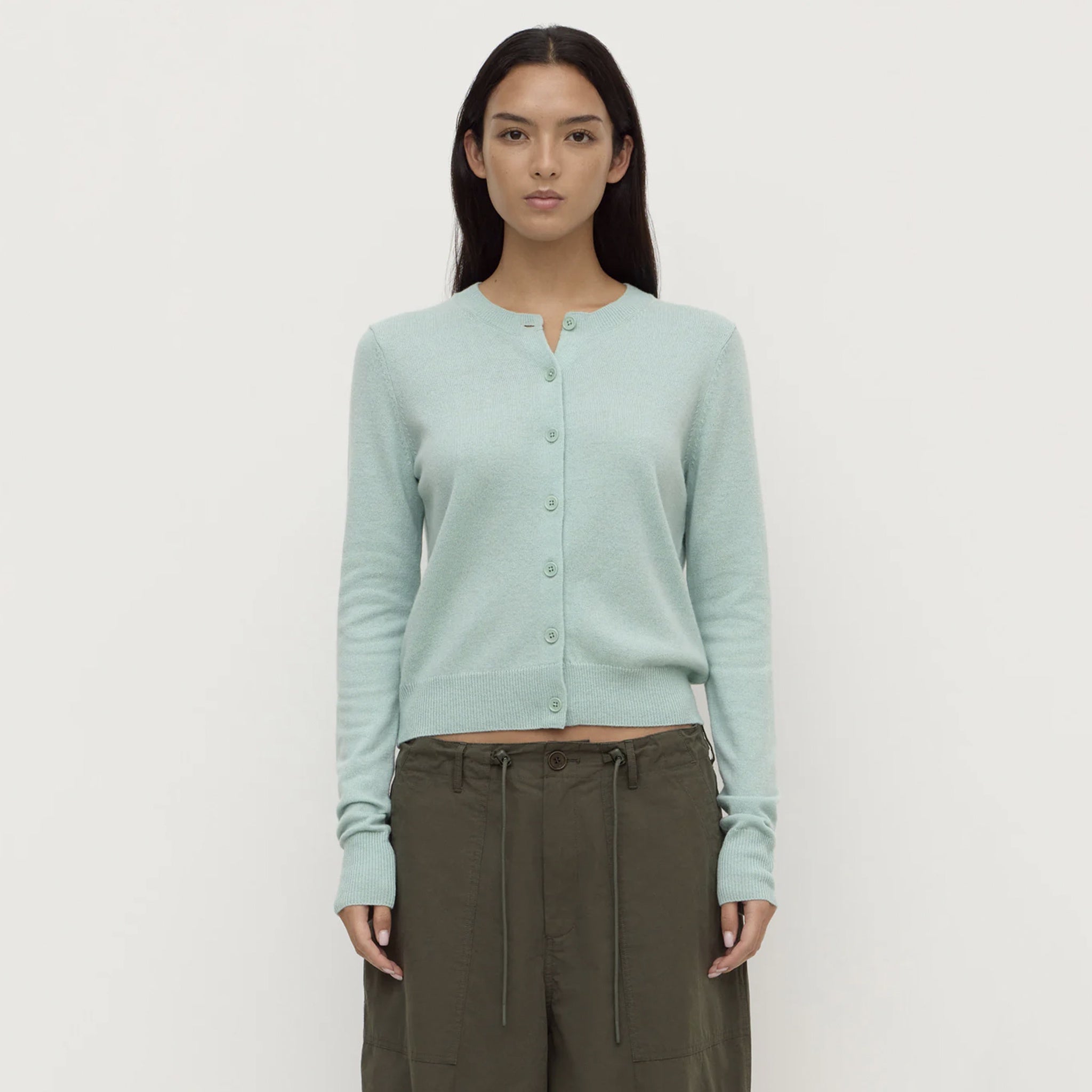 Assembly Label Benny Wool & Yak Knit Cardigan - Mint worn by a model with light mint hue and cropped design.
