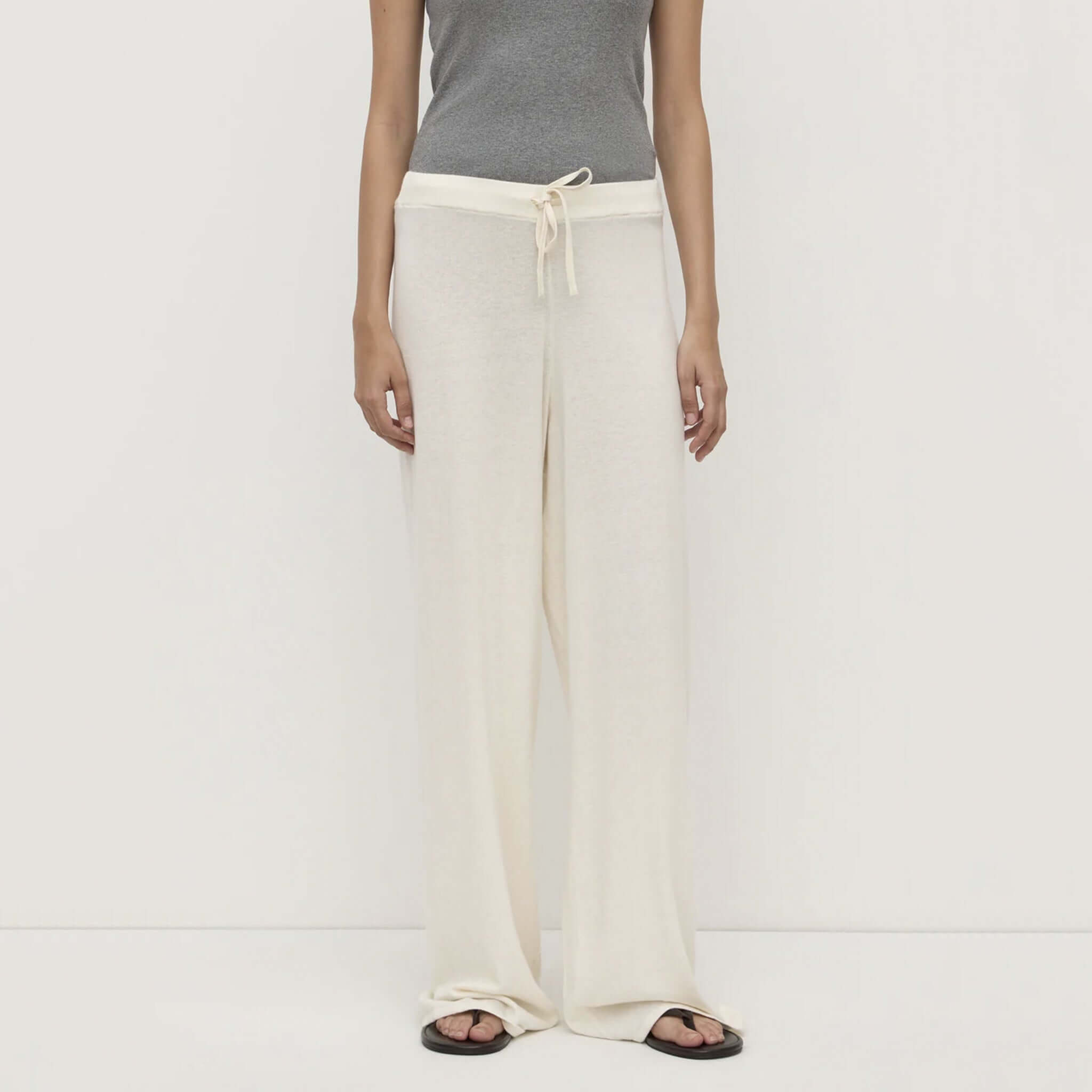 Alt Tag: Assembly Label Cotton / Cashmere Lounge Pants - Cream relaxed leg lounge pants with elastic waistband and waist tie, front view