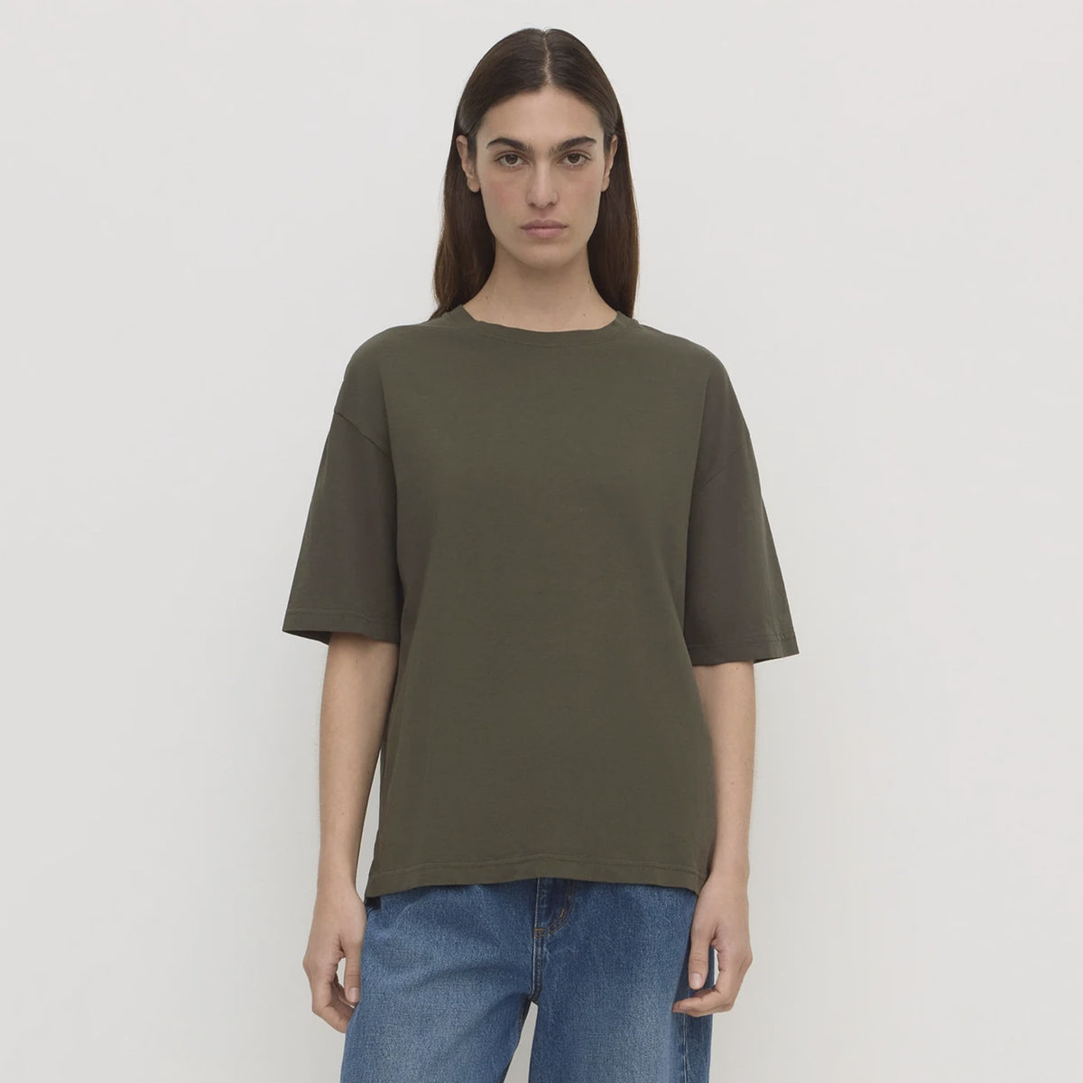 Assembly Label Kira Cotton Hemp Tee - Dark Military, front view on model with jeans
