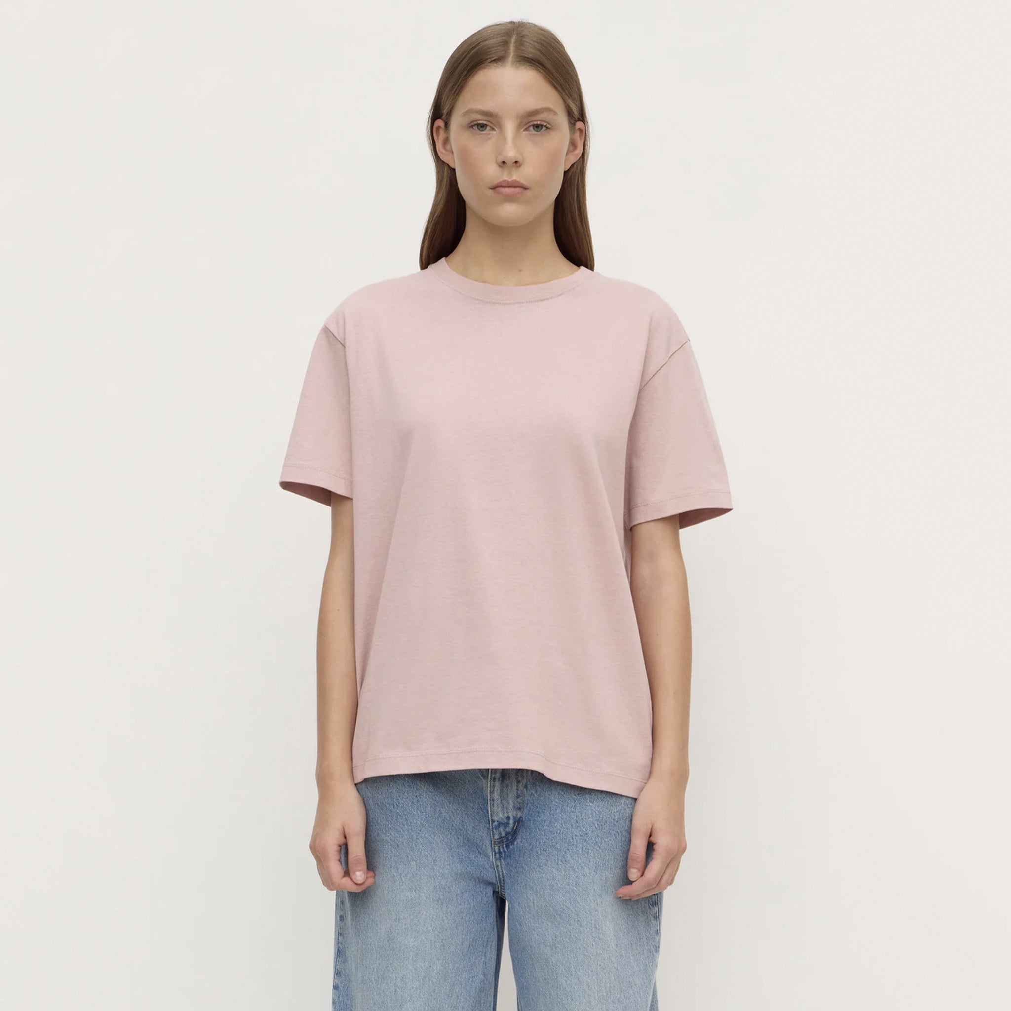 Alt Tag: Assembly Label Organic Cotton Base Tee - Blush relaxed crew neck organic cotton jersey t-shirt on model, front view